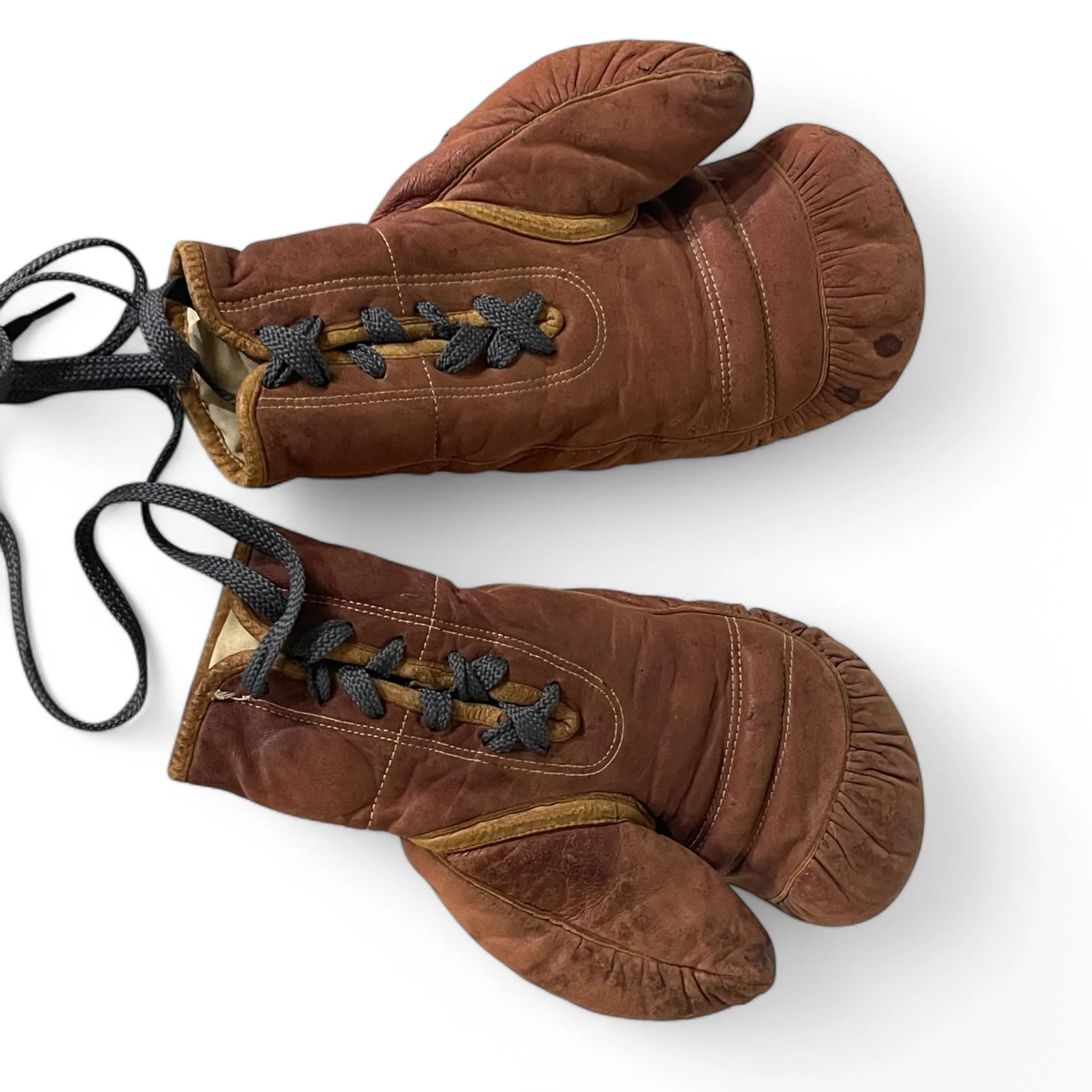 Pair of vintage 1950s Everlast Model EF G8 boxing gloves with rich patina, perfect for game room decor, man cave display, or gift for sports memorabilia collectors.