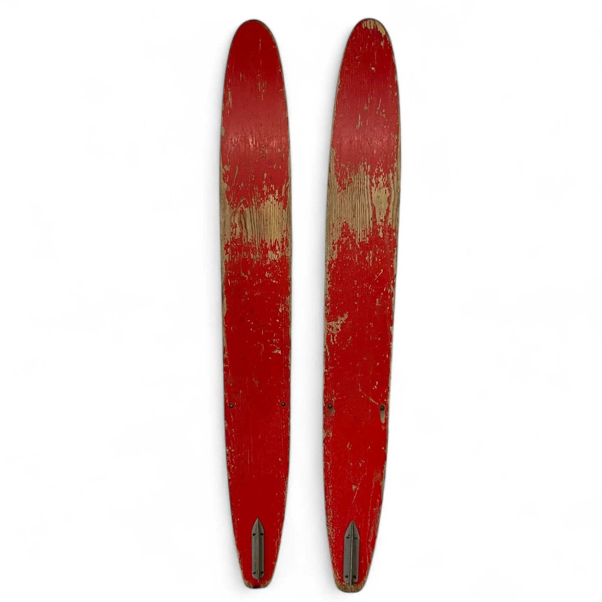Vintage pair of red white Sears Shorty Combo wooden water skis, well weathered and perfect for beach house decor.
