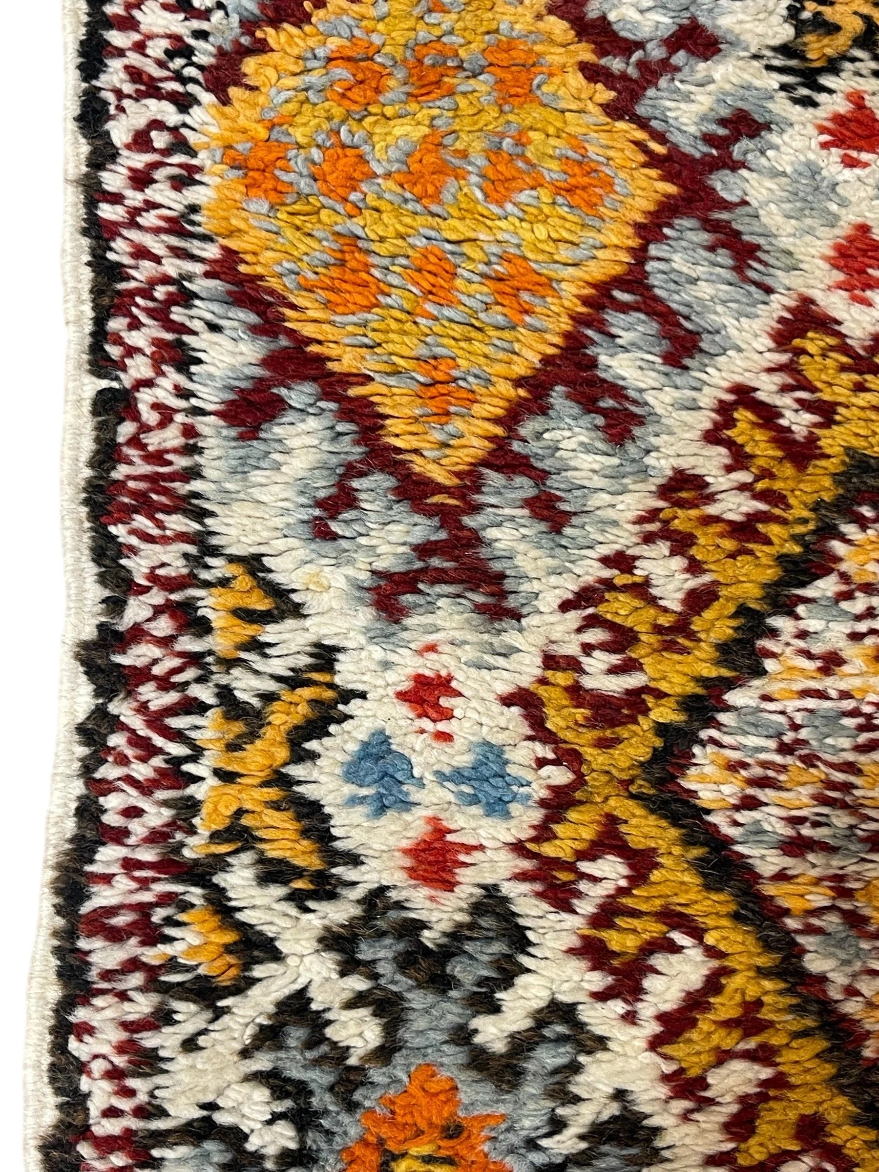 Vintage 1960s Moroccan rug 3x5 with tassels. Colorful geometric pattern.