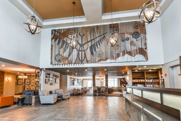 So excited to finally see our most ambitious art install to date in its new home. Made from almost 100% reclaimed materials, this piece is symbolic of the area. Made by hand, with our 4 hands. Photo credit: Four Points by Sheraton Barrie. (Contact us for your custom signage needs).