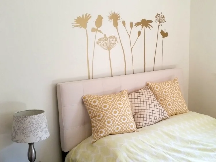 Bring the outdoors in for a simple update to any room. Our Wildflower wall decals are shown here in metallic gold and come prearranged as shown. Photo credit: Rachel Goodman http://www.wallstargraphics.com/rustic-woodland/rustic-flowers-wall-decal