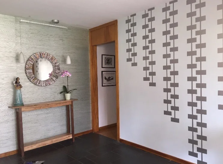 A geometric wall decal featuring a rectangle pattern connected together by lines. Perfect for a modern inspired space.