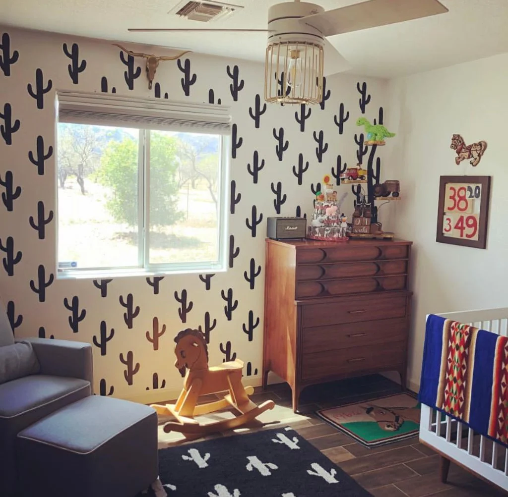 Cactus wall decals by Wall Star Graphics shown in black in a western themed nursery.