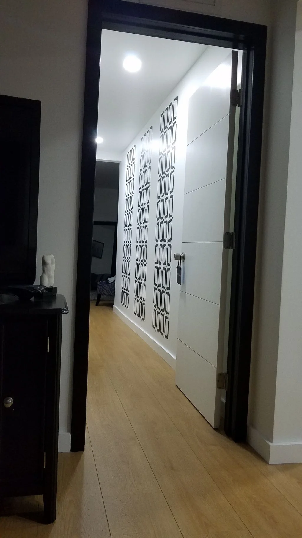 Modern vinyl wall decal in a stylish geometric pattern, ideal for mid century interior design, retro style, bold, contemporary