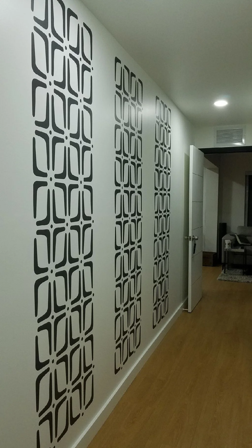 Modern vinyl wall decal in a stylish geometric pattern, ideal for mid century interior design, retro style, bold, contemporary