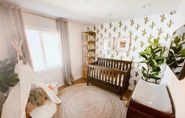 Cactus wall decals by Wall Star Graphics shown in a boho modern themed nursery.