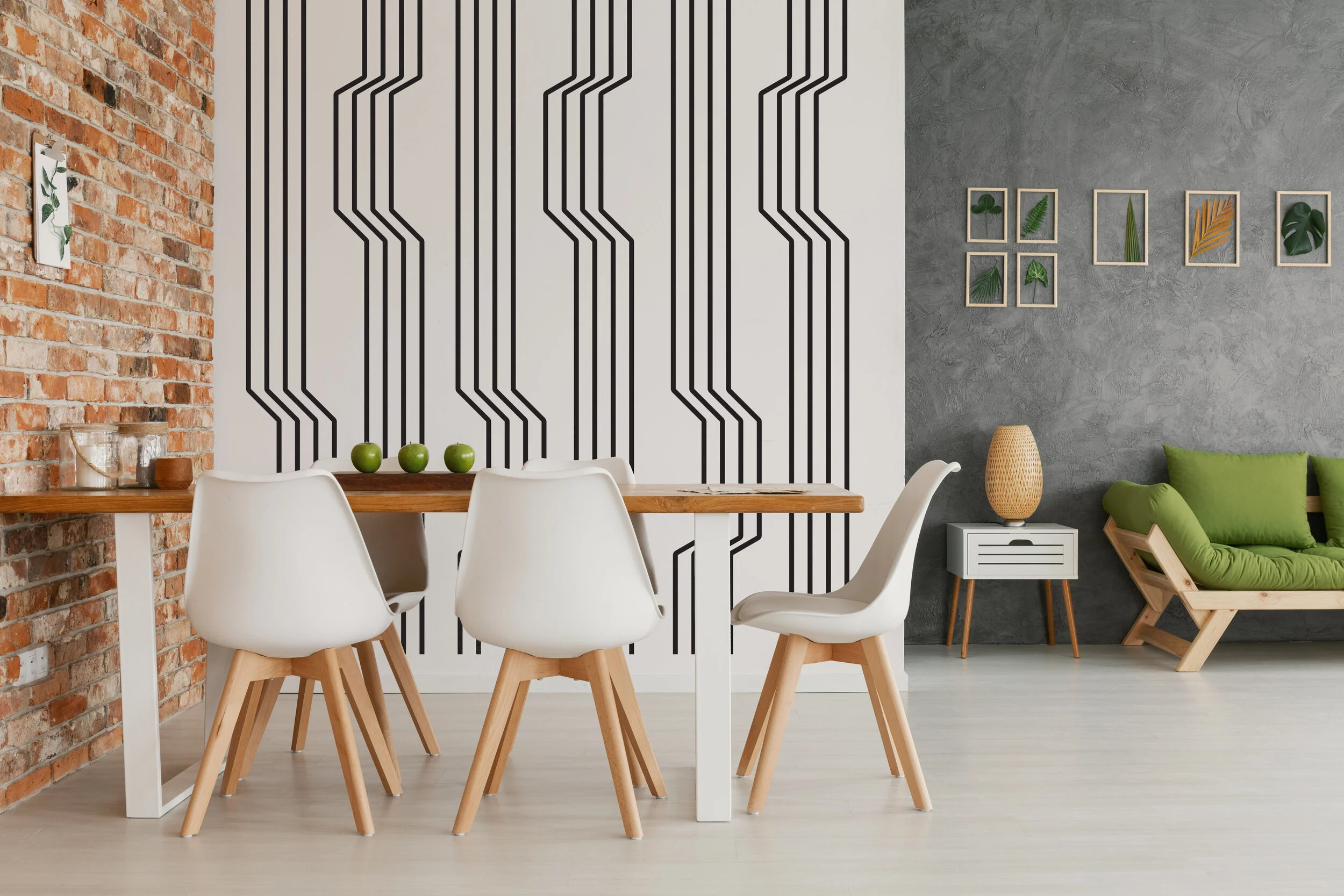 Line wall decals in a geometric pattern by Wall Star Graphics on a white wall in a minimalist interior.
