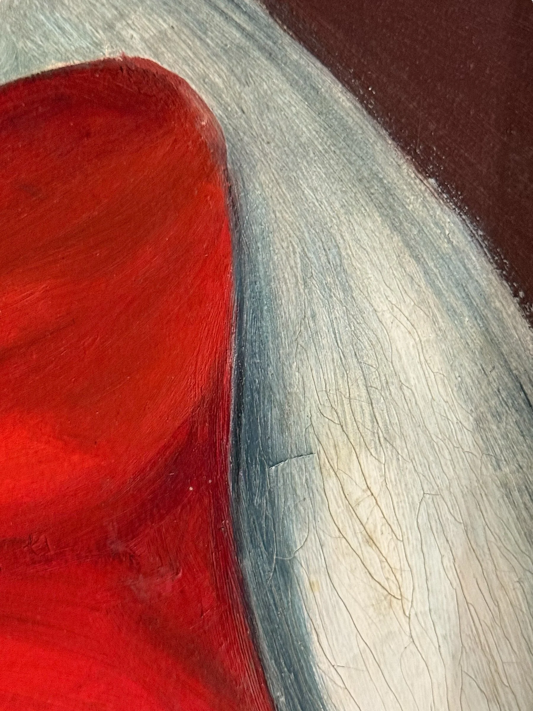 Close up view of brushstrokes on an original vintage 1960s clown painting.