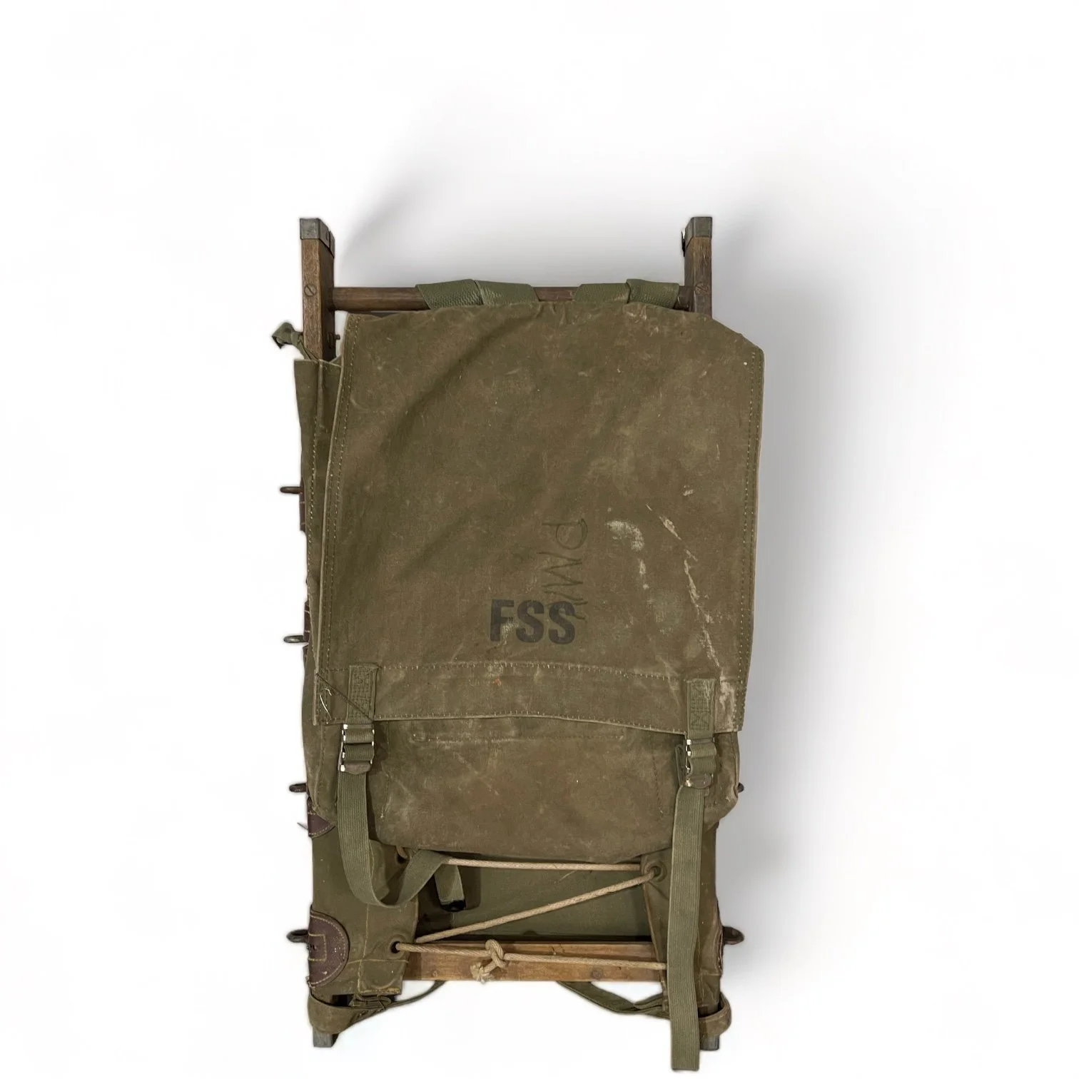 Vintage US Forest Service Wood Packboard Backpack and frame with Army green canvas, leather and metal accents with weathered wood.