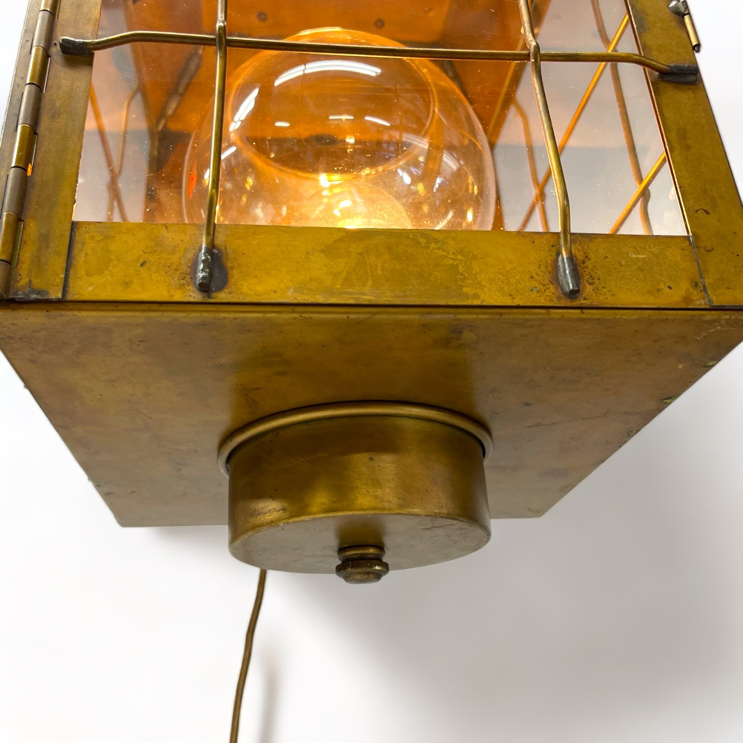 Vintage pair of hard wired brass nautical lantern lights suitable for indoor/outdoor use, made by Hollywood Lighting Fixture Co.