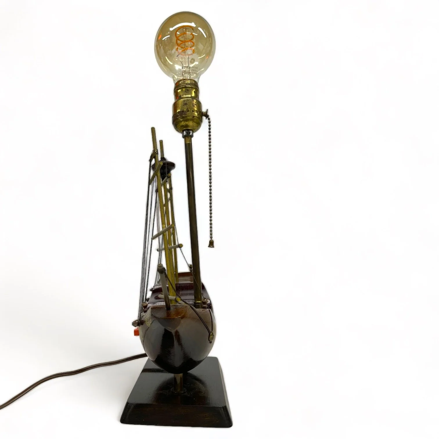 Vintage wooden Santa Maria ship lamp made of teak with ornate details, made in Holland.