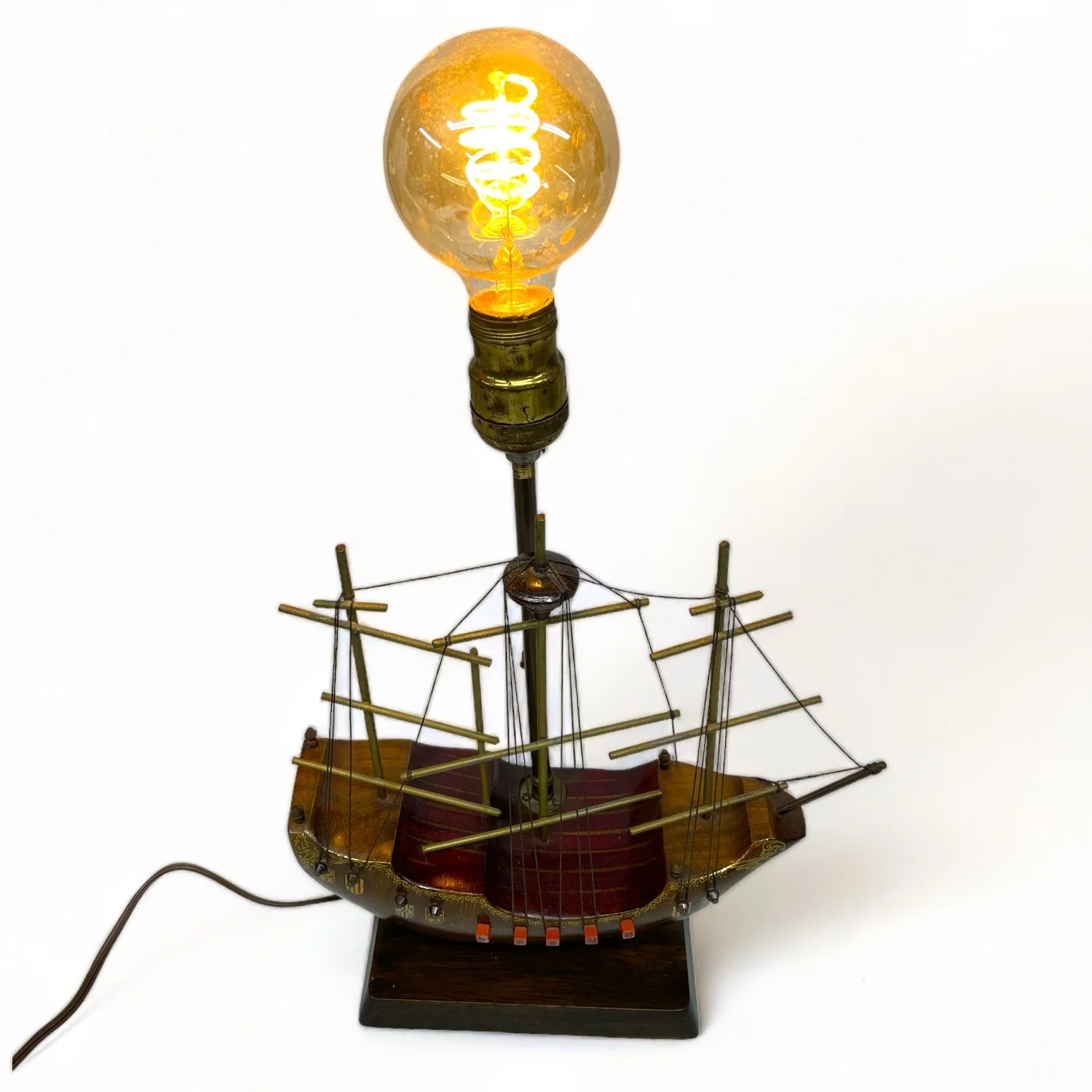 Vintage wooden Santa Maria ship lamp made of teak with ornate details, made in Holland.