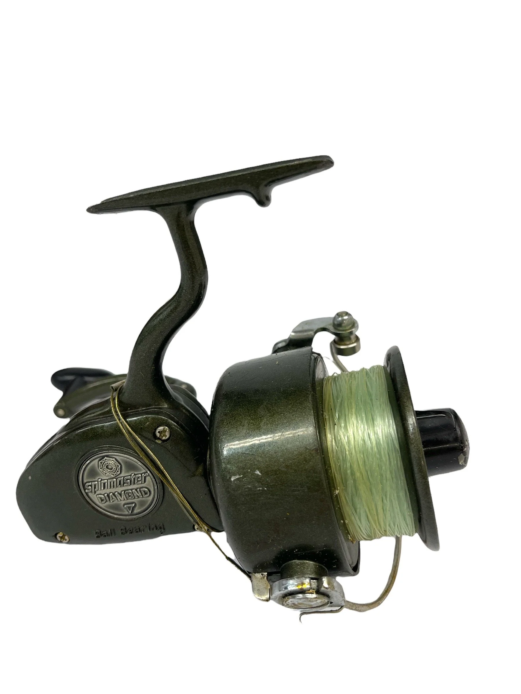 A green Spinster Diamond Ball Bearing fishing reel.