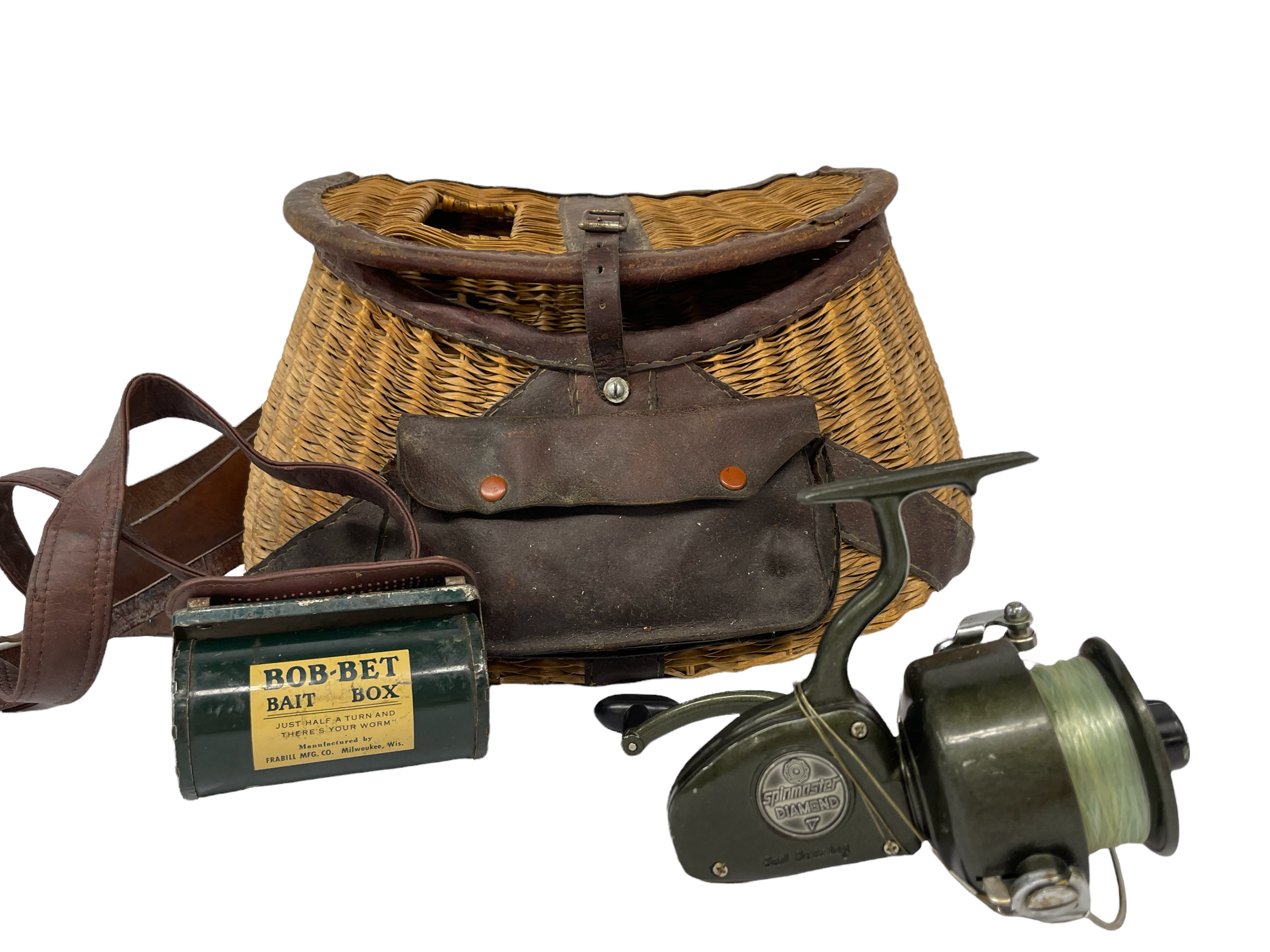 A set of vintage fishing items or gifts for anglers that consists of a Spinster Diamond Ball Bearing fishing real, a vintage fishing creel, and a vintage green metal Bob Bet Bait Box.