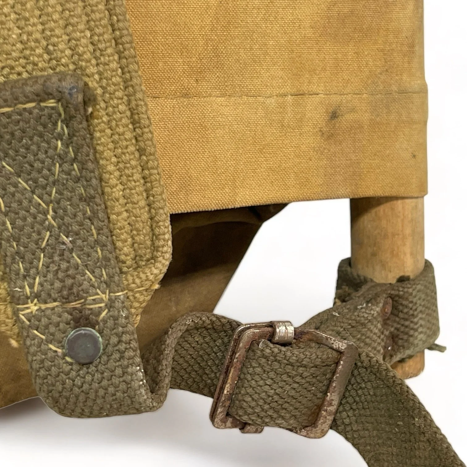 A vintage White Stag trapper's style Army green backpack with wooden frame made by Hirsch Weis Canvas Prod. Co., Portland, Oregon. Made in USA