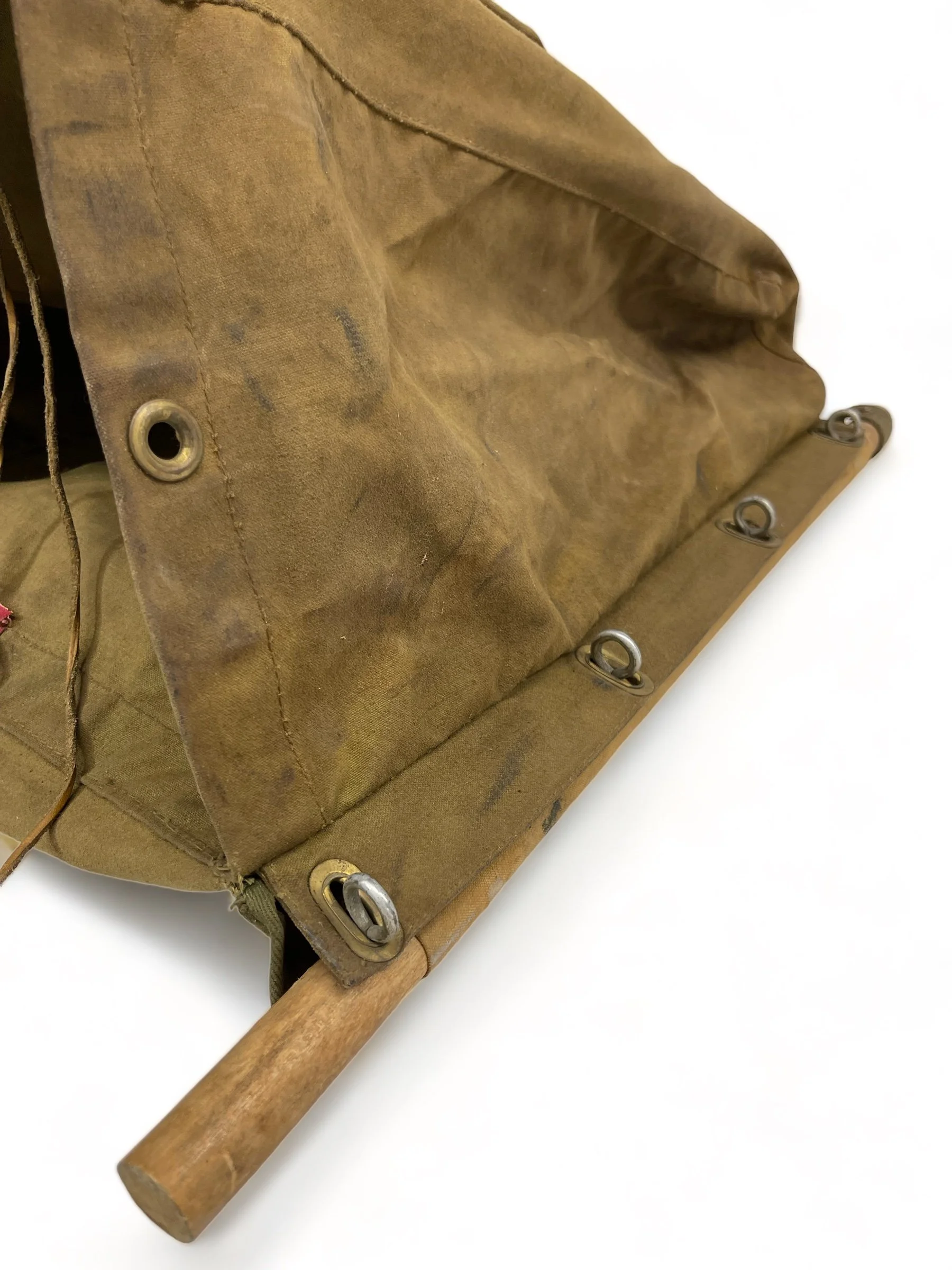 A vintage White Stag trapper's style Army green backpack with wooden frame made by Hirsch Weis Canvas Prod. Co., Portland, Oregon. Made in USA