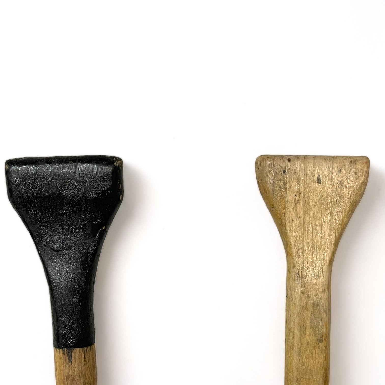 Pair of mismatched 59 inch weathered wooden boat oars, perfect for beach house or coastal living and nautical decor.