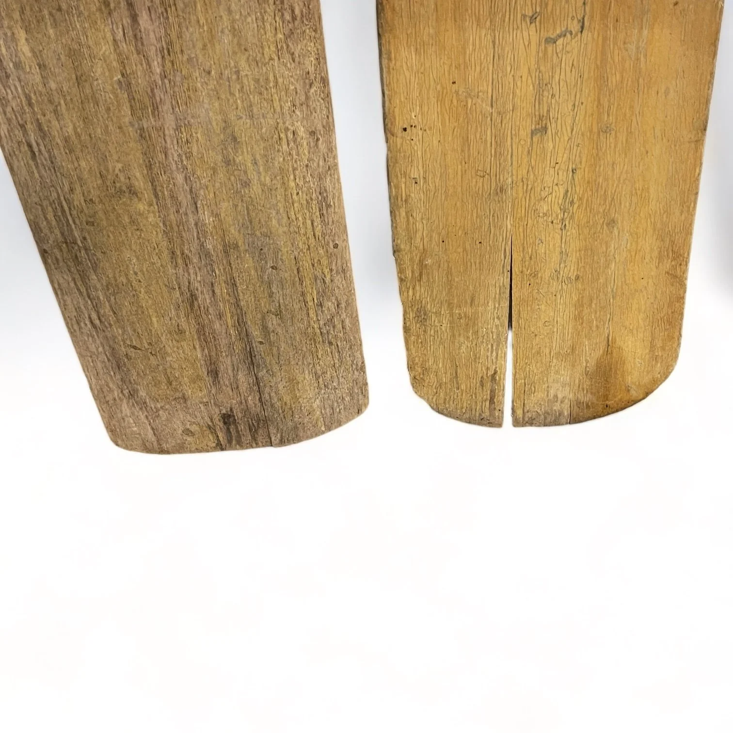 Pair of mismatched 59 inch weathered wooden boat oars, perfect for beach house or coastal living and nautical decor.