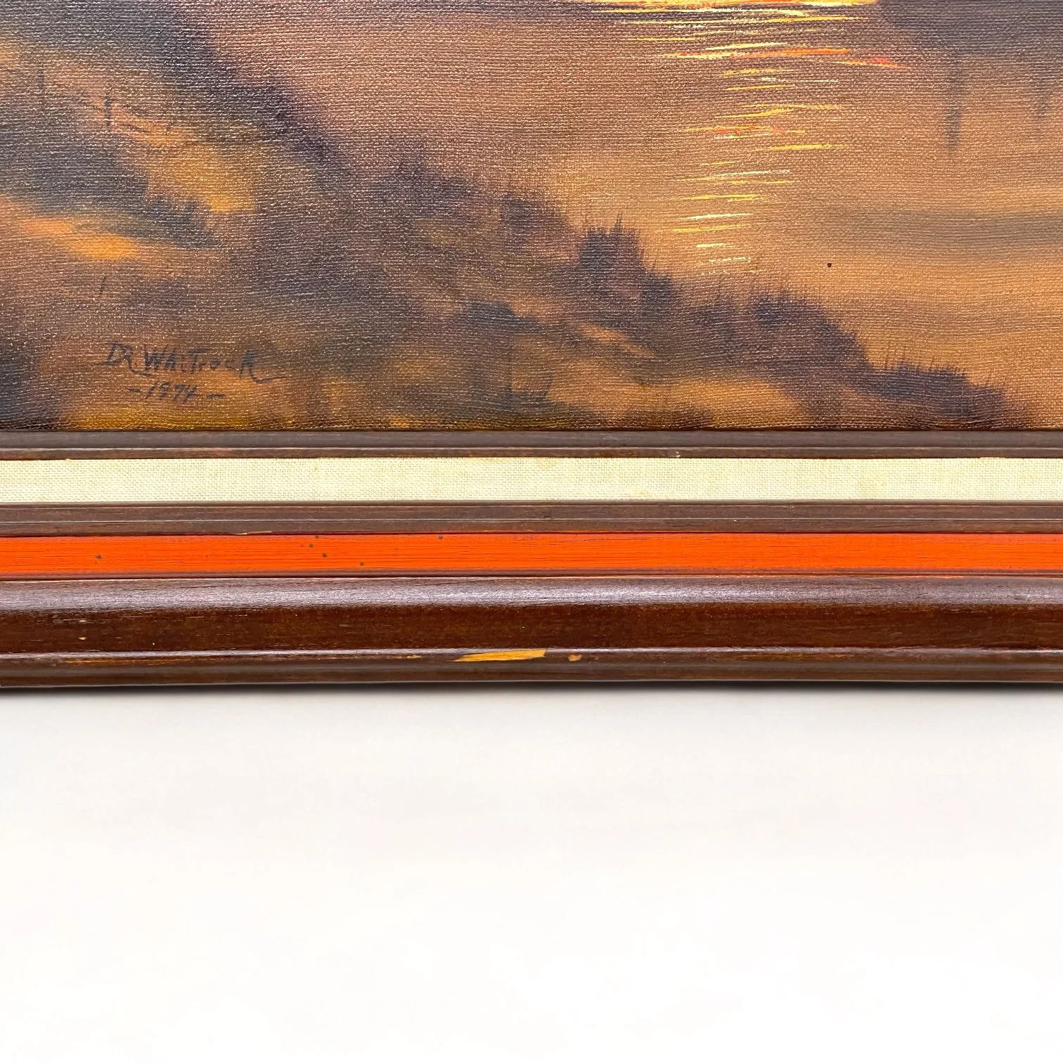 Vintage 1970s Sailboat Painting on the Water at Sunset Framed, horizontal orientation measuring 30x18 inches. Signed and dated by artist.