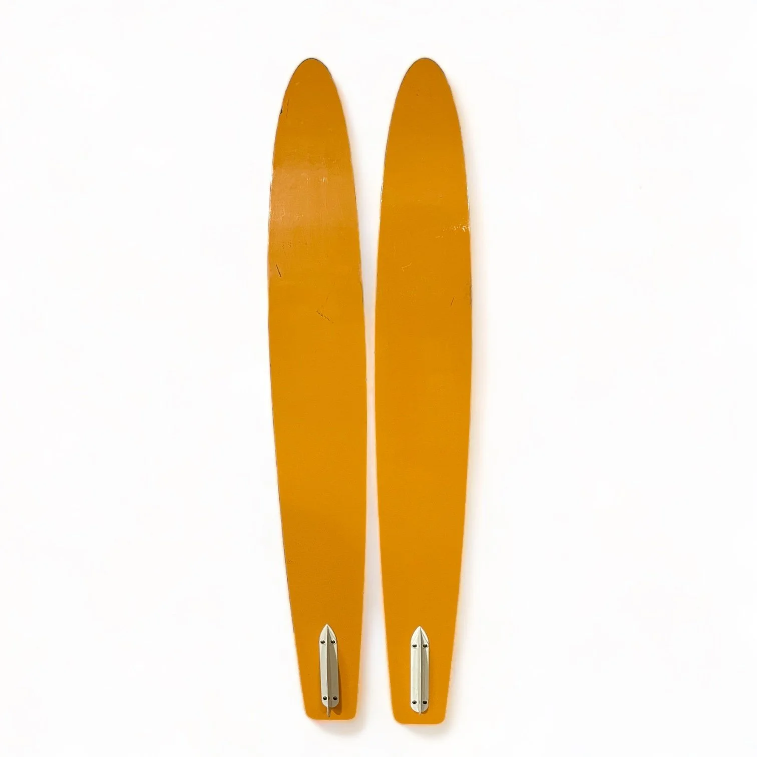 Vintage red and yellow Lil Rascal wooden water skis for kids with a dolphin logo by Lake Region. Made in USA