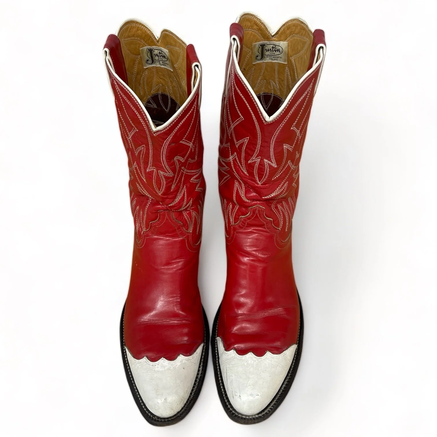 Front view of a vintage pair women's 1970s Justin two toned red and white leather cowboy boots, style L4069, size 8 1/2 B
