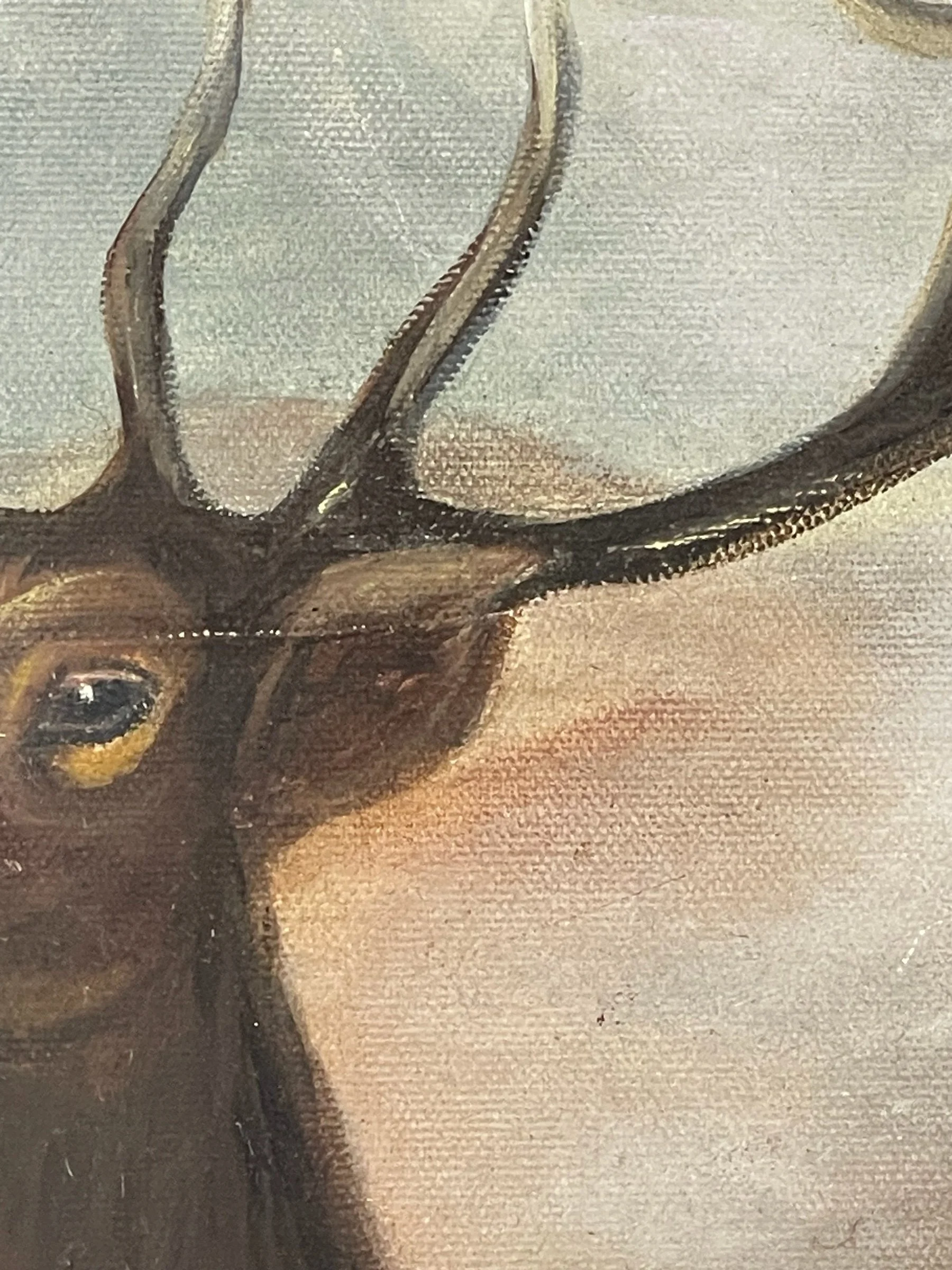 Vintage painting of an elk title 'Trails End' by artist J. Graham, signed and dated 1993. The vertical artwork measures 28x24 inches and is framed in a heavy duty, ornate wood frame.