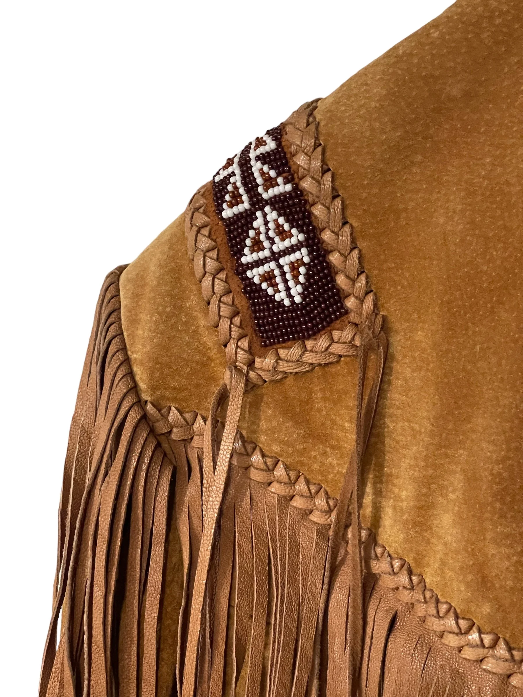 Close up of shoulder on a vintage Echo Mountain Arturo Suede Fringe and Beaded Jacket Size 36, Western Wear Made in Mexico