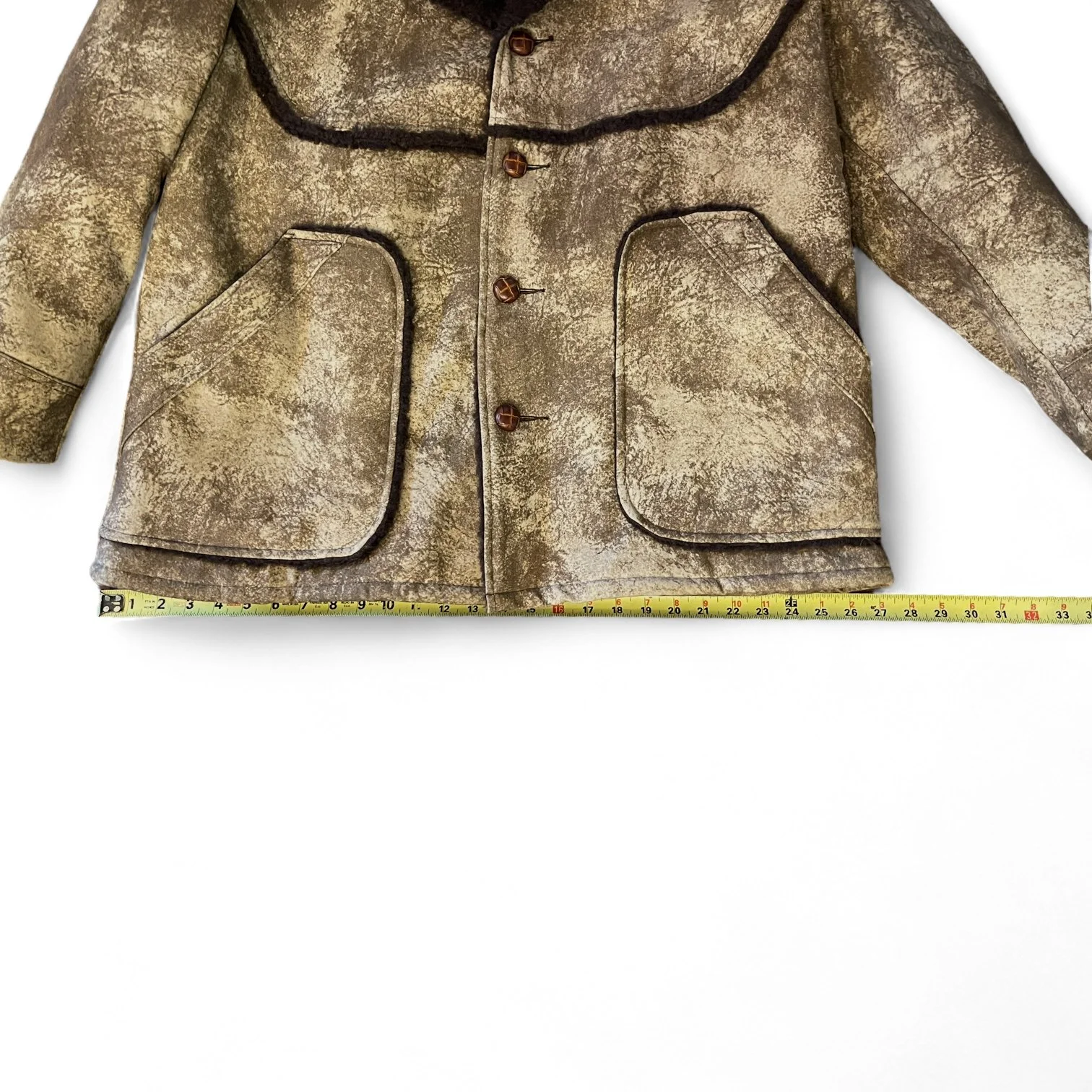 A vintage men's Sherpa Lined Rancher Jacket hanging on a vintage wooden hanger. Size XL Made in USA, Classic Ranch Style Western Wear, by Wiman.