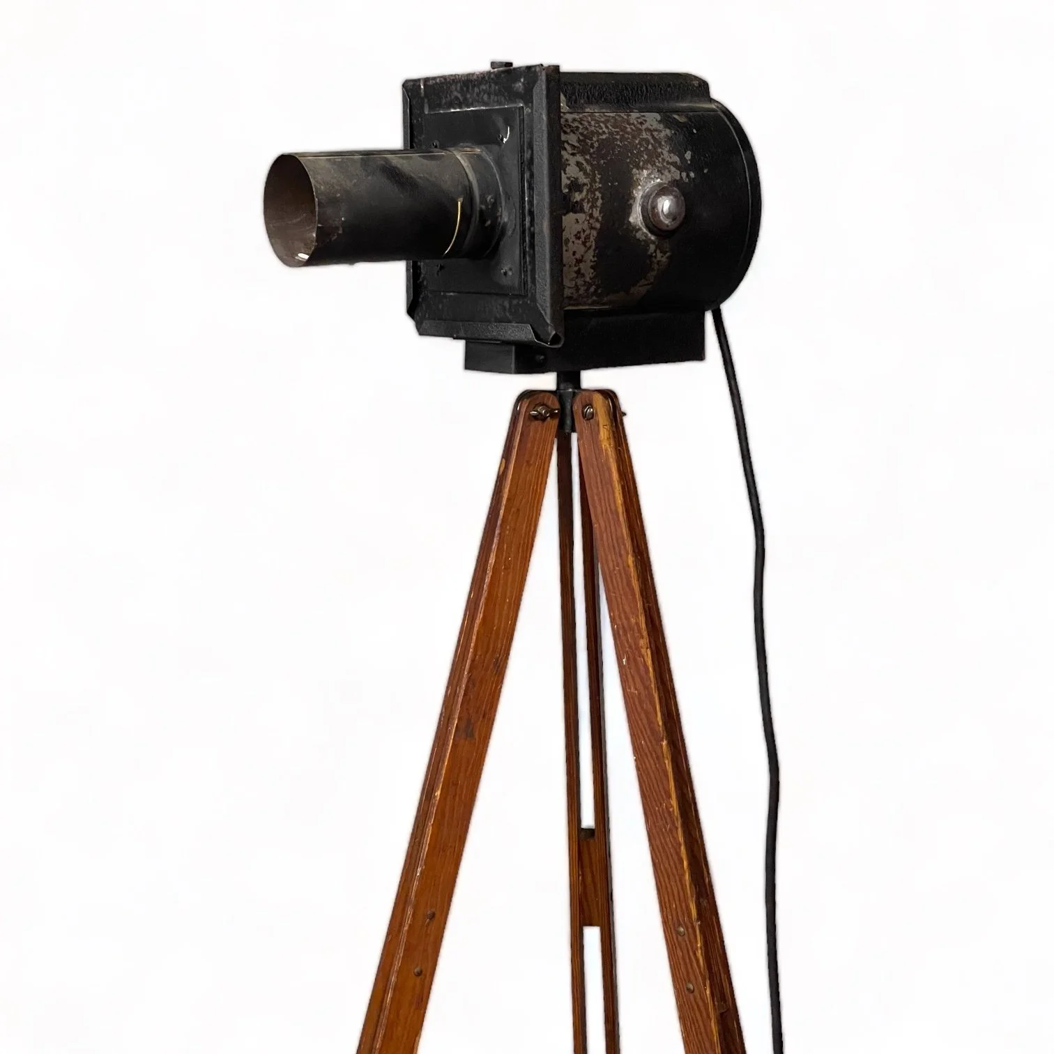 Upcycled vintage stage and theater spotlight floor lamp with non adjustable vintage wooden tripod with original Kopp glass lens.