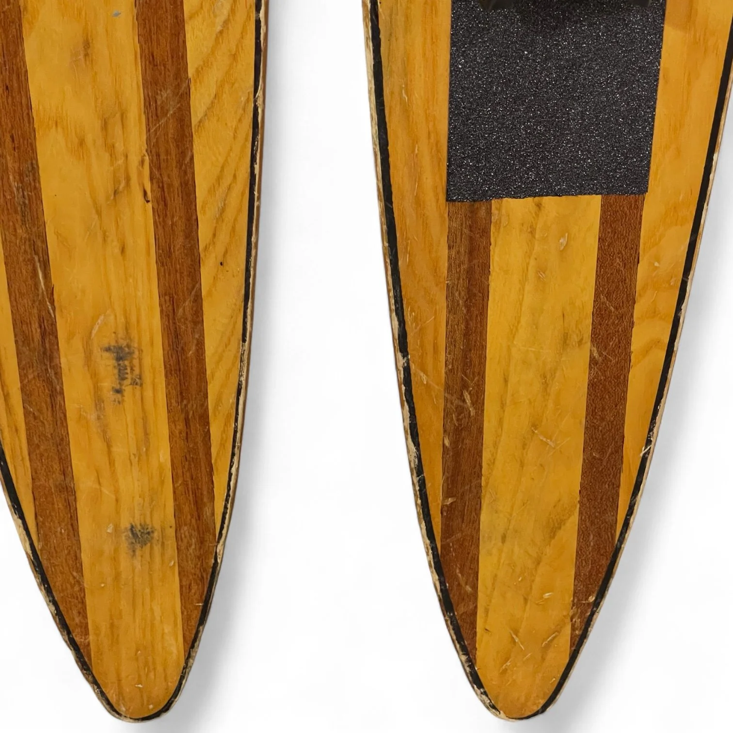 1960 pair vintage wooden water skis by Lund, Capri Chuck Stearns model. Wood grain front with red painted backside. Includes original black rubber and metal bindings.