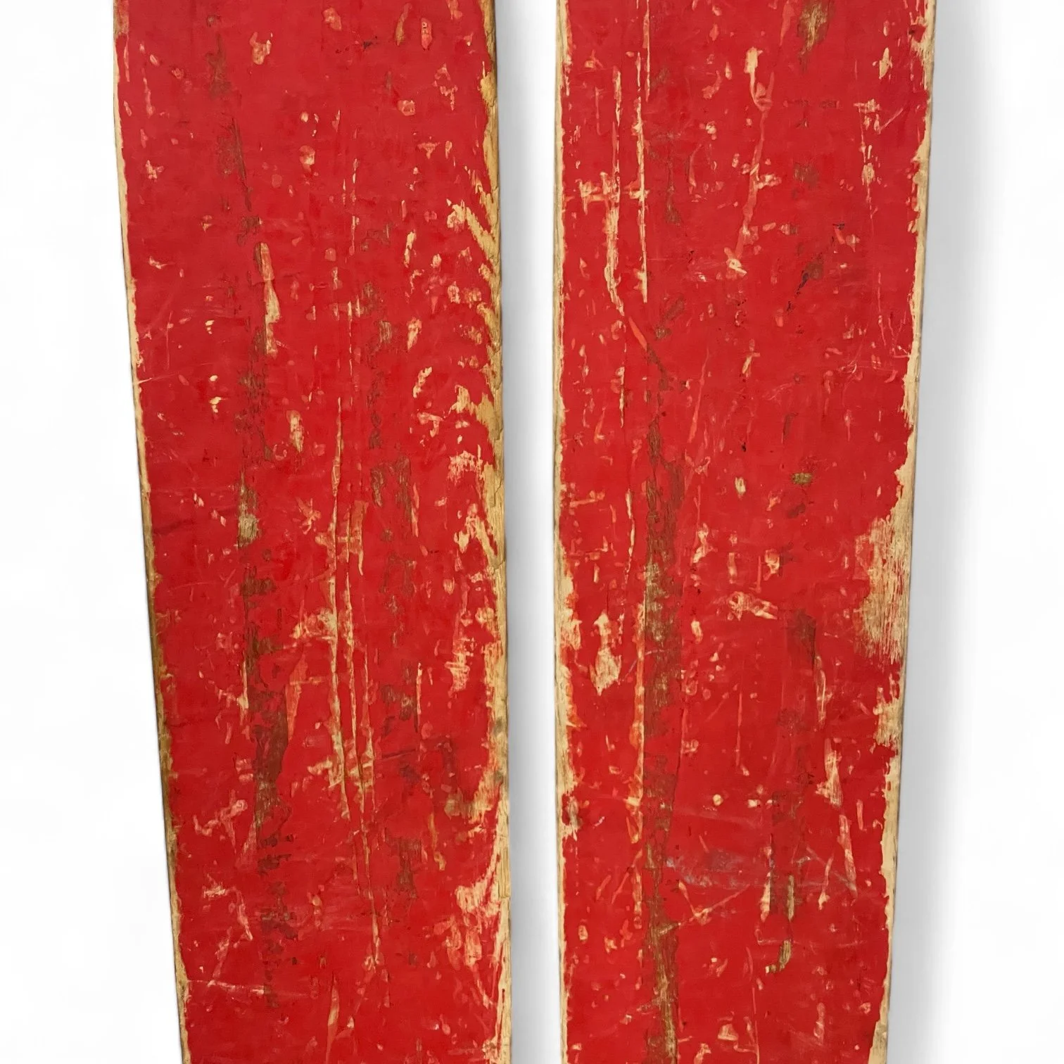 1960 pair vintage wooden water skis by Lund, Capri Chuck Stearns model. Wood grain front with red painted backside. Includes original black rubber and metal bindings.