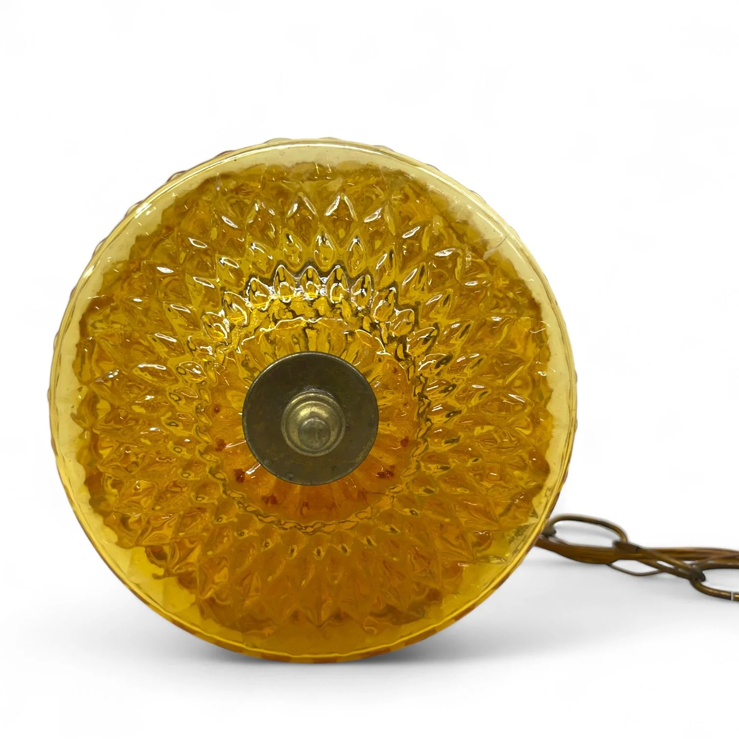 Vintage Mid Century Pendant Hanging Light with chain. Golden Amber Faceted Glass in a geometric floral pattern in a cylinder shape.