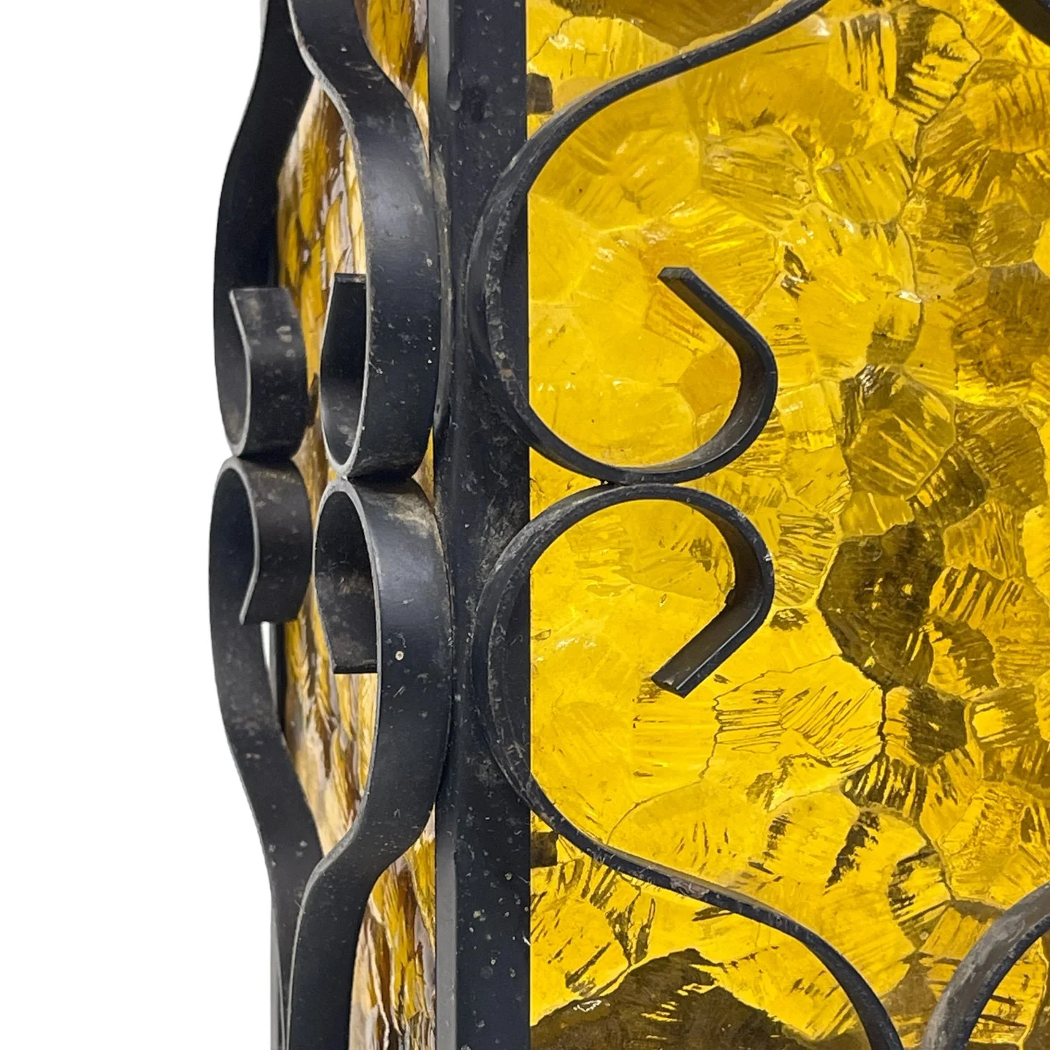 Vintage Spanish Revival hardwired hanging black wrought iron pendant light with amber glass suitable for indoor or outdoor use.