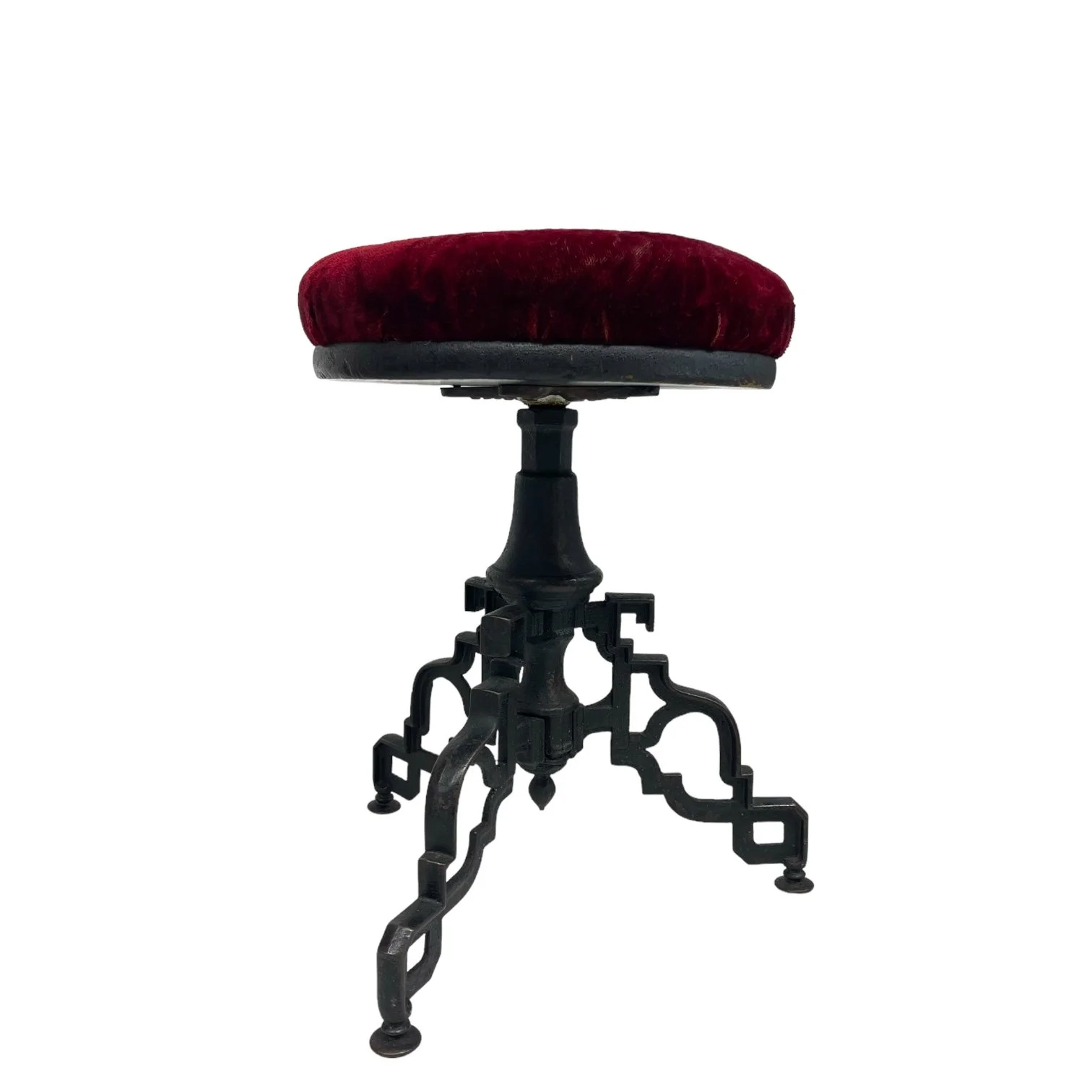Vintage goth Spanish Revival adjustable stool with cast iron base and a red velvet round seat.