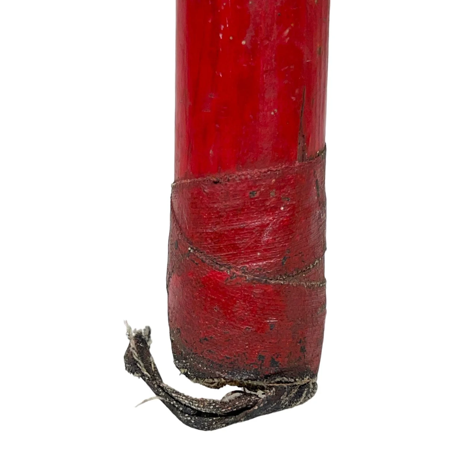 A pair of vintage wooden boat oars with aged red paint on the paddles.