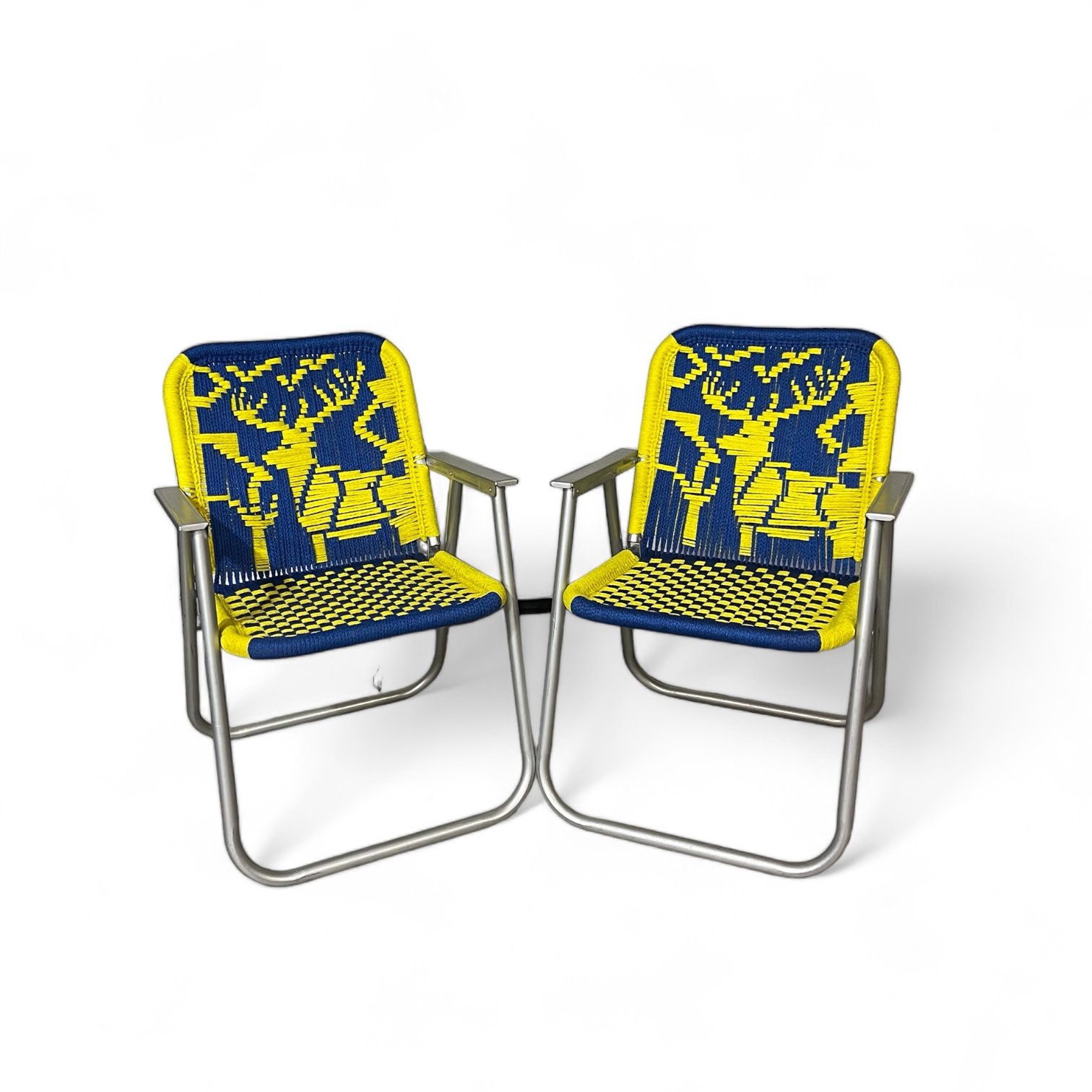 Vintage retro aluminum lawn chairs set of 2 with macrame seat and backrest in a bright yellow and blue deer pattern.