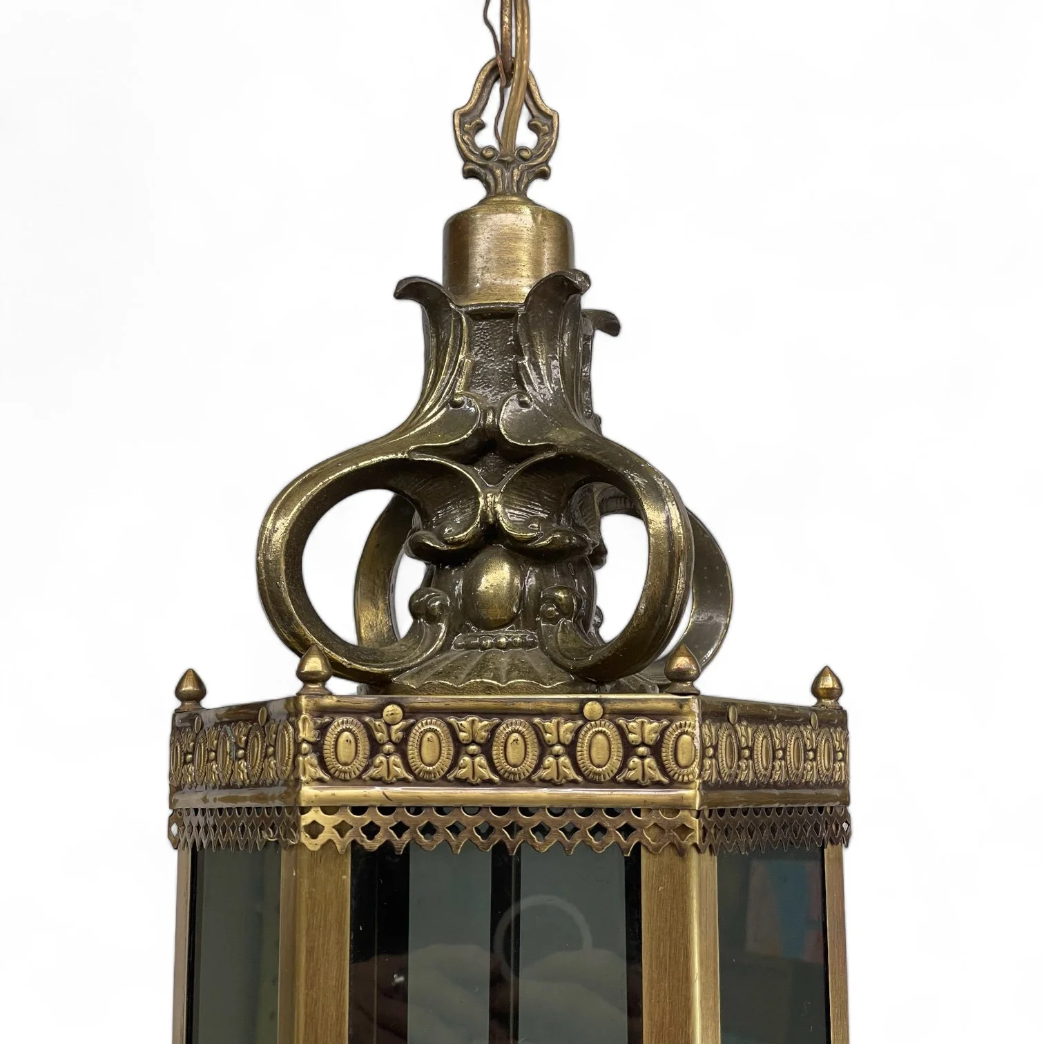 Vintage Spanish Revival gothic style hanging hardwired light with frosted candelabra style light bulbs.