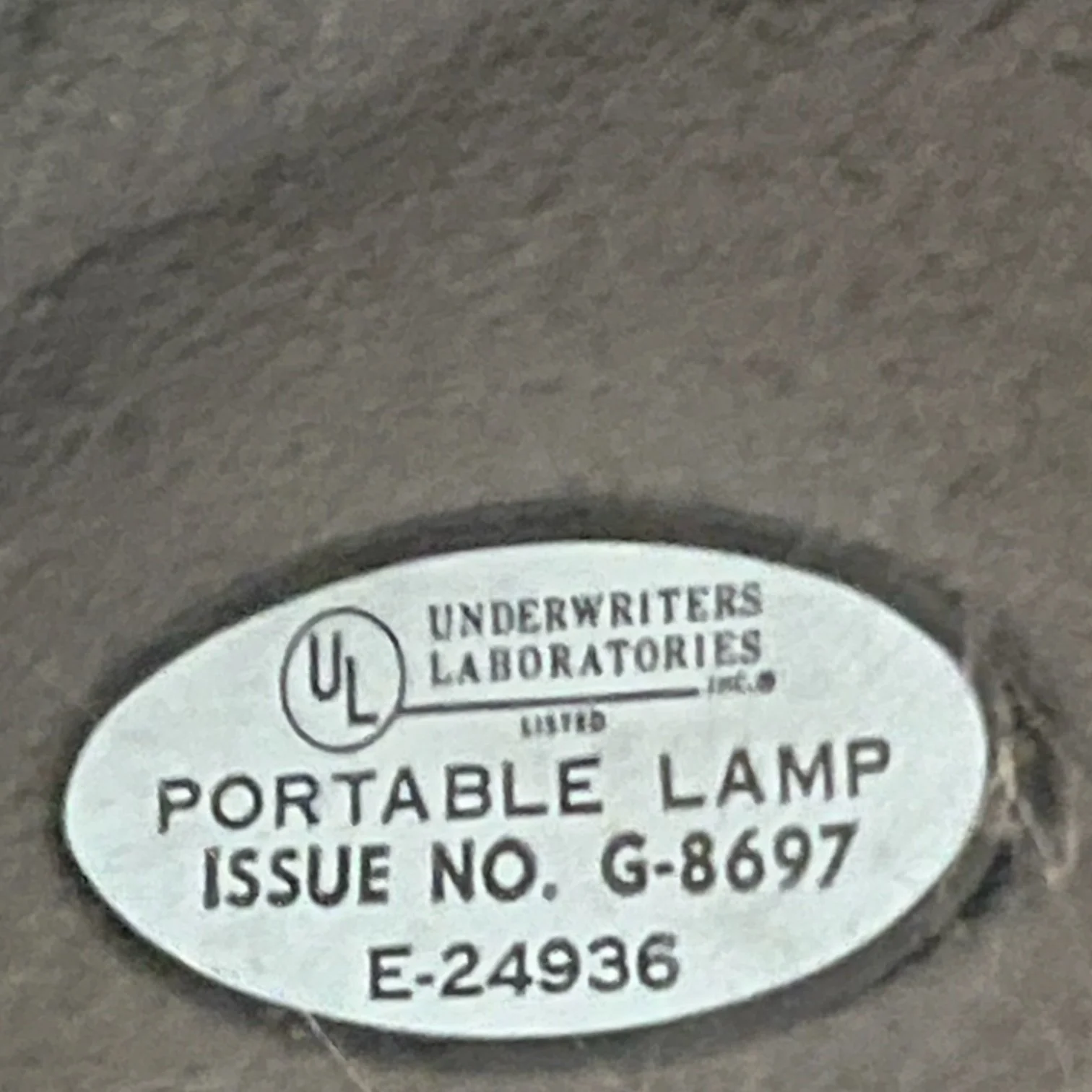 UL Portable Lamp Issue No. G-8697 E24936 label on a vintage floor lamp.