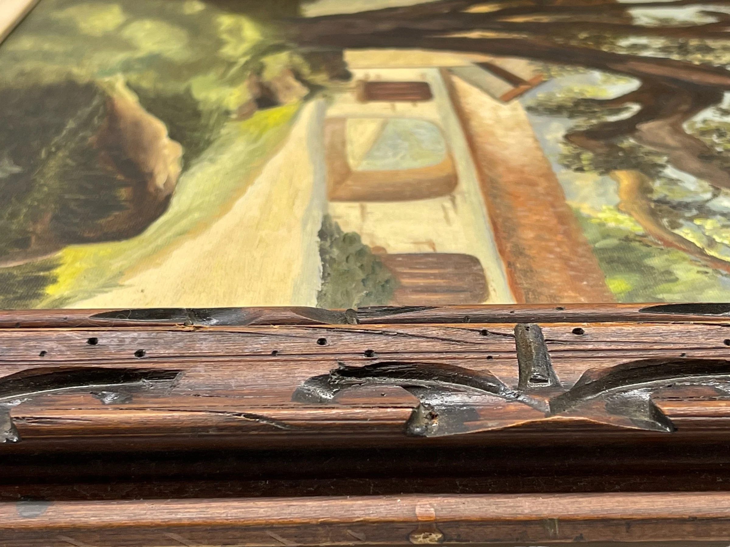 Vintage 32 x 26 inch original painting of oak tree and Spanish style home, in muted earth tone colors in a hand carved wood frame.