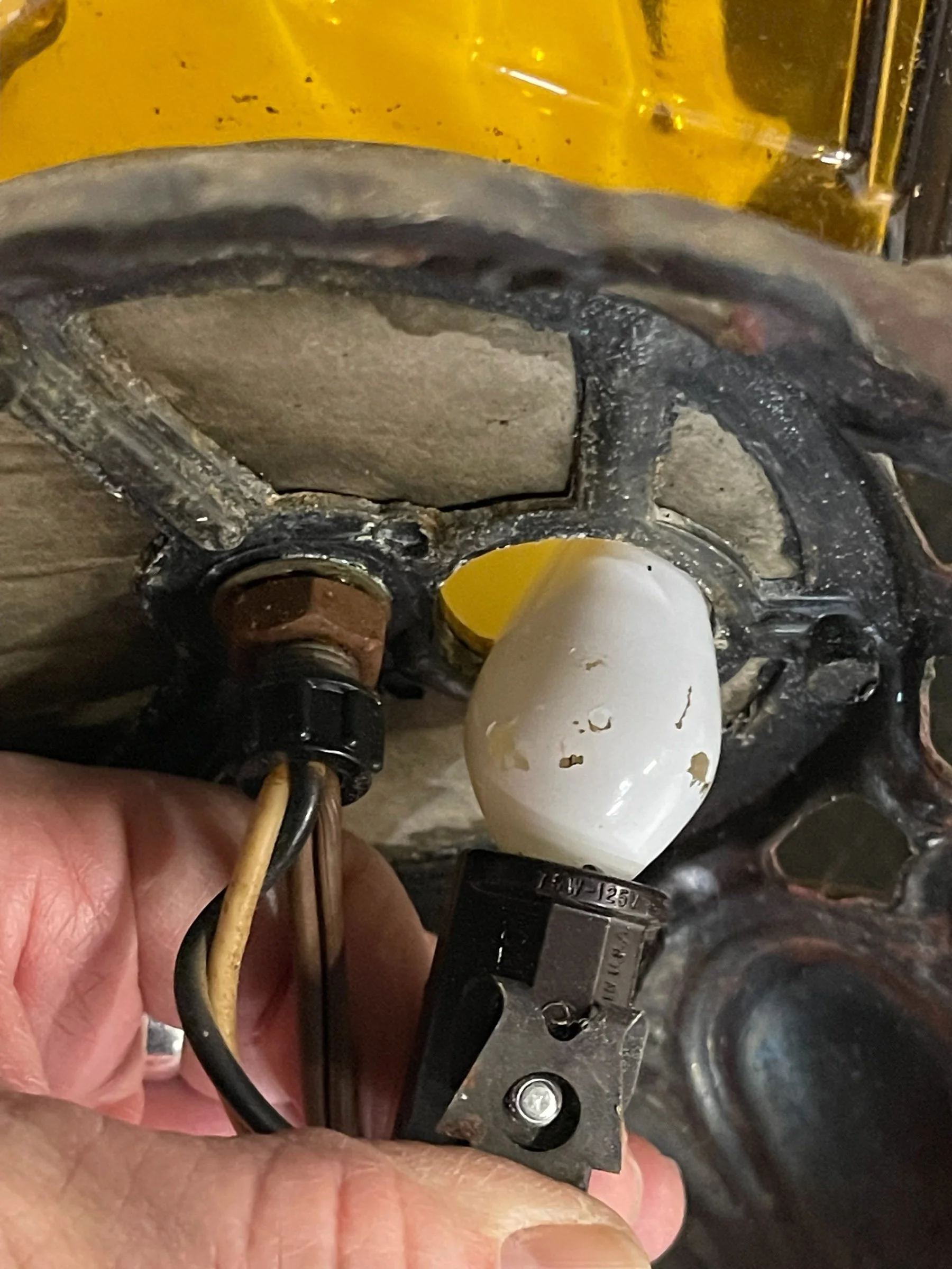 Vintage amber glass and ornate metal table lamp, no shade. Featuring double light option. Perfect for Hollywood Regency, Spanish Revival, or mid century modern interiors.