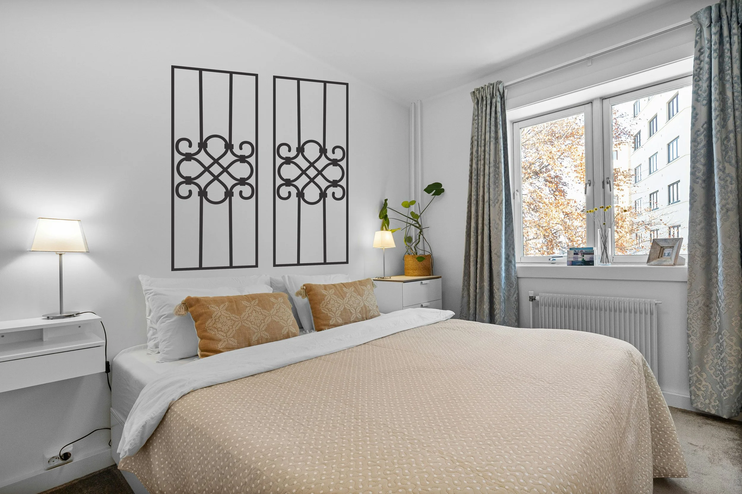 Geometric Mid Century wall decal set creating a custom headboard accent with removable matte vinyl.