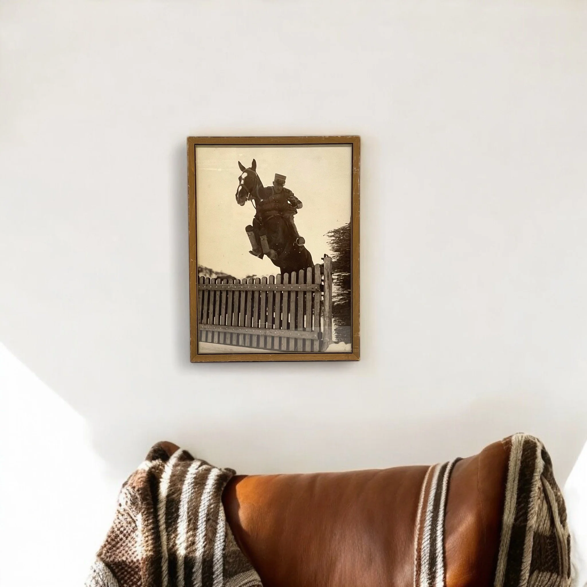 Vintage original photo of military man on horseback jumping fence. Professionally framed. Vertical orientation. Minimalist cabin or lodge wall art.