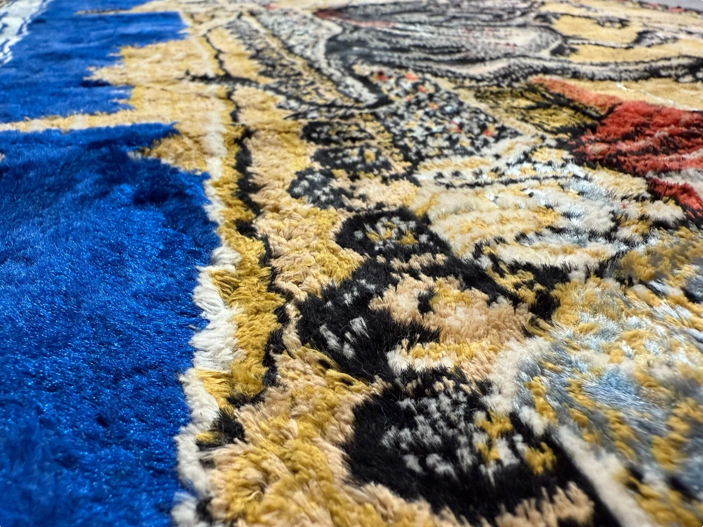 Angled view of a vintage of a Spanish bullfight textile mid century wall art style