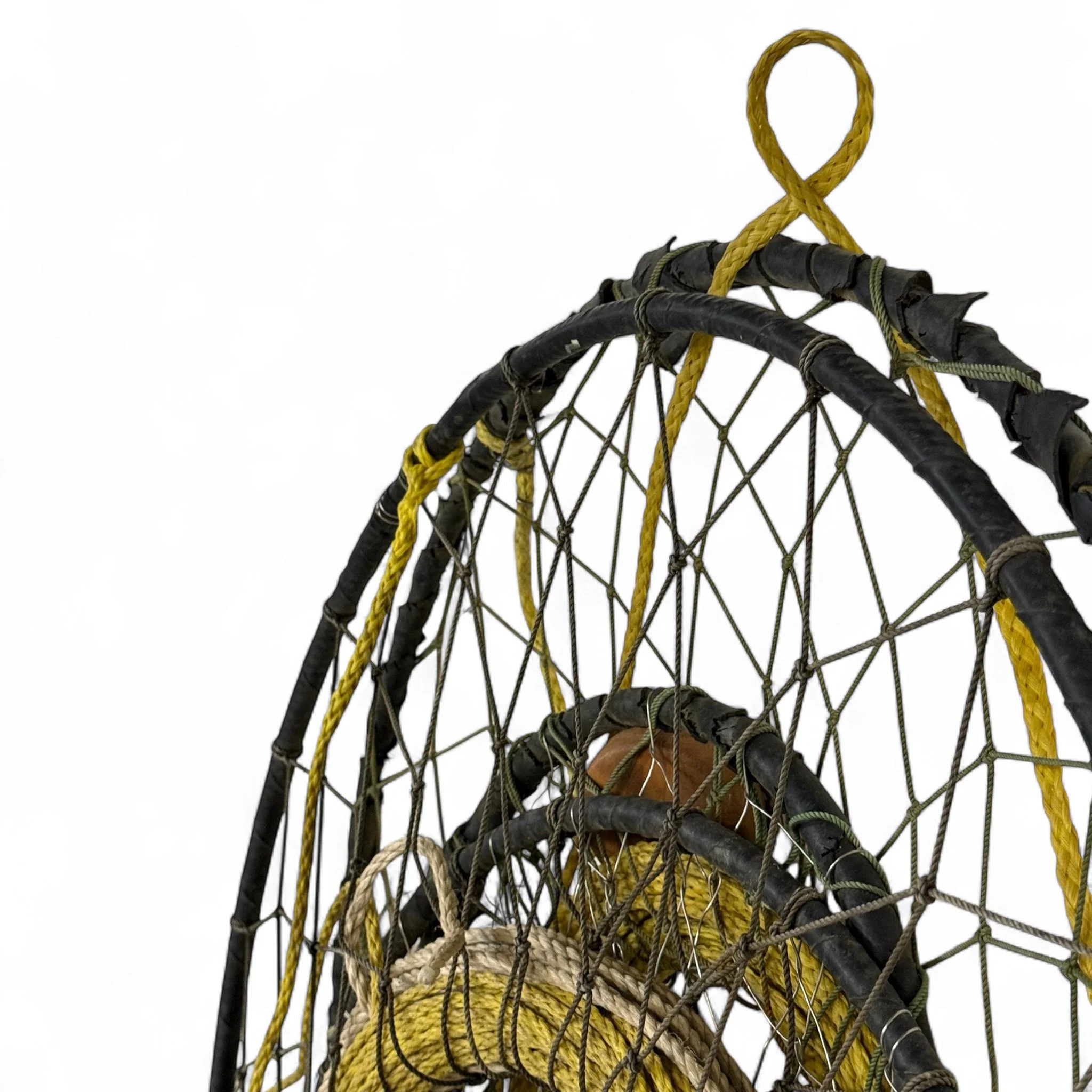 Pair of vintage large ring crab traps with weathered patina, ideal for nautical or coastal wall decor in a rustic beach or lake house setting, or seafood restaurant.