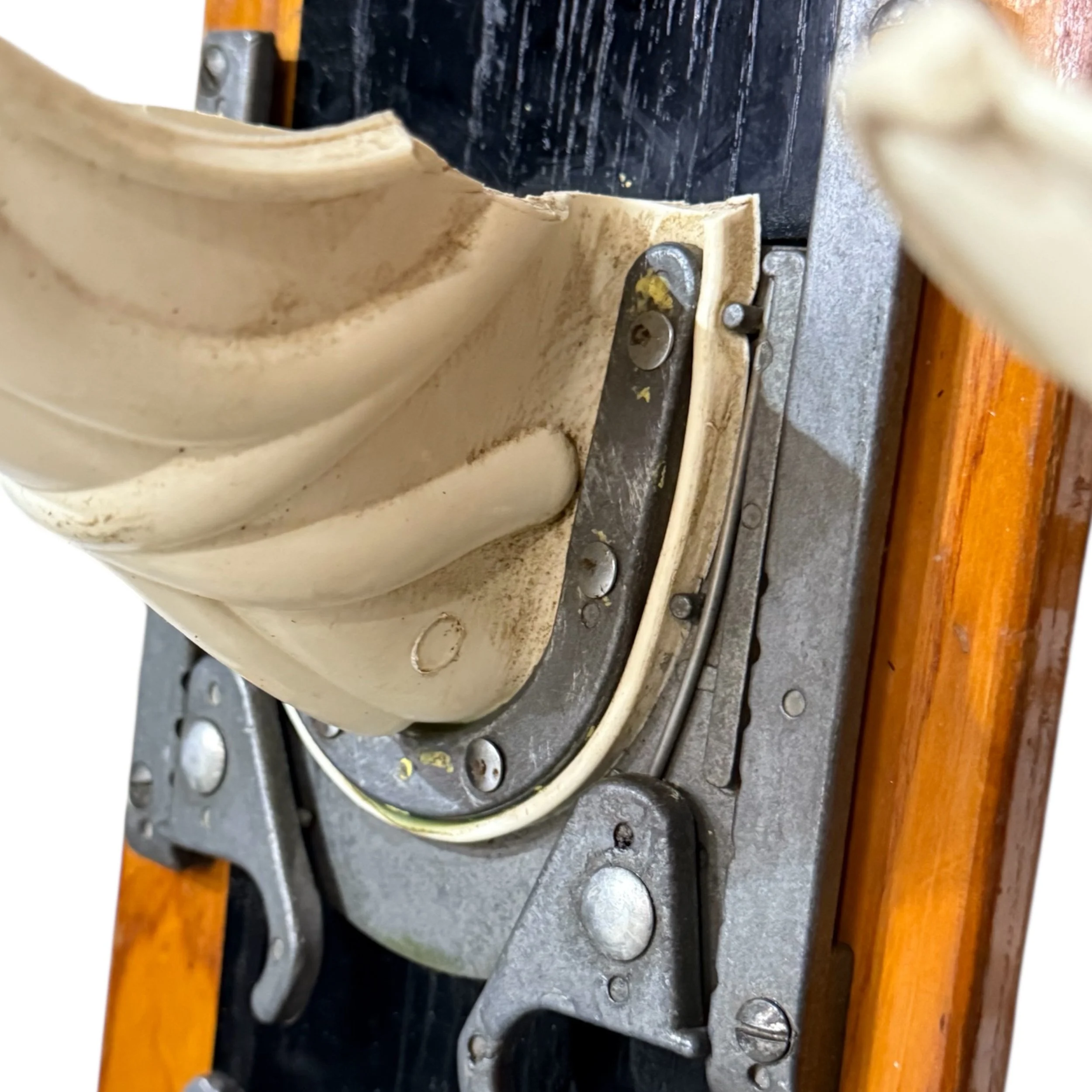 Detail of bindings and wood grain on vintage Ski Craft Junior Combo water skis