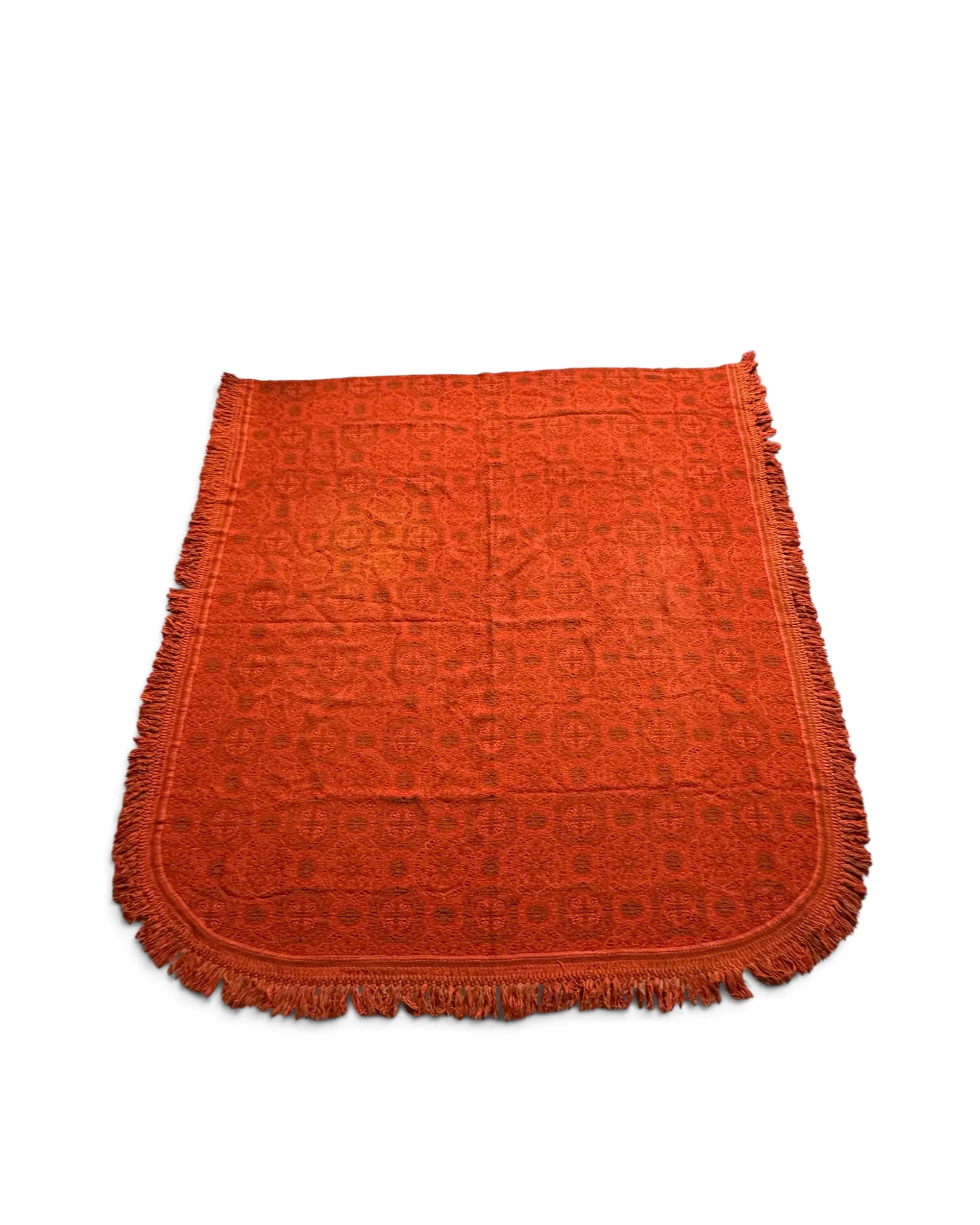 Vintage 1960s Bellissimo bedspread made in Italy, featuring richly textured red woven fabric, intricate decorative motifs, and fringe. Measures 93 x 89 inches and fits a full or queen size bed.