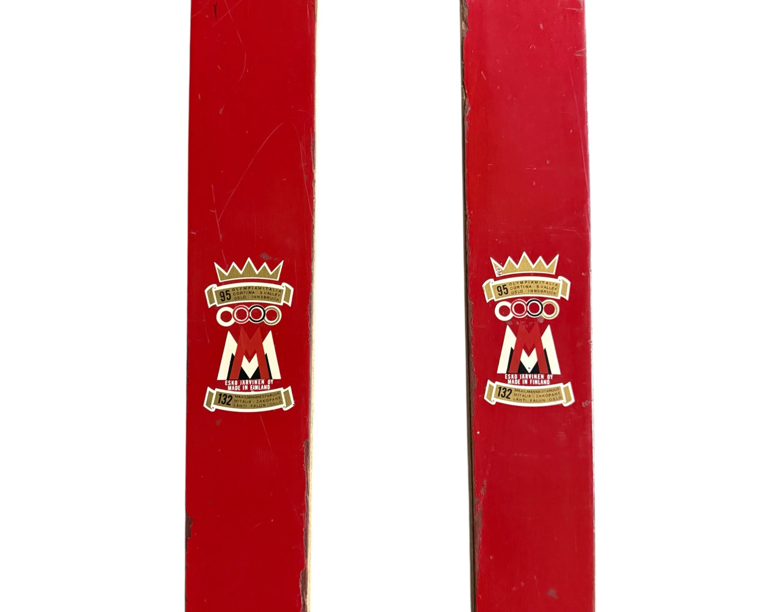 close up view of Esko Jarvinen logo, made in Finland, on vintage red wooden snow skis