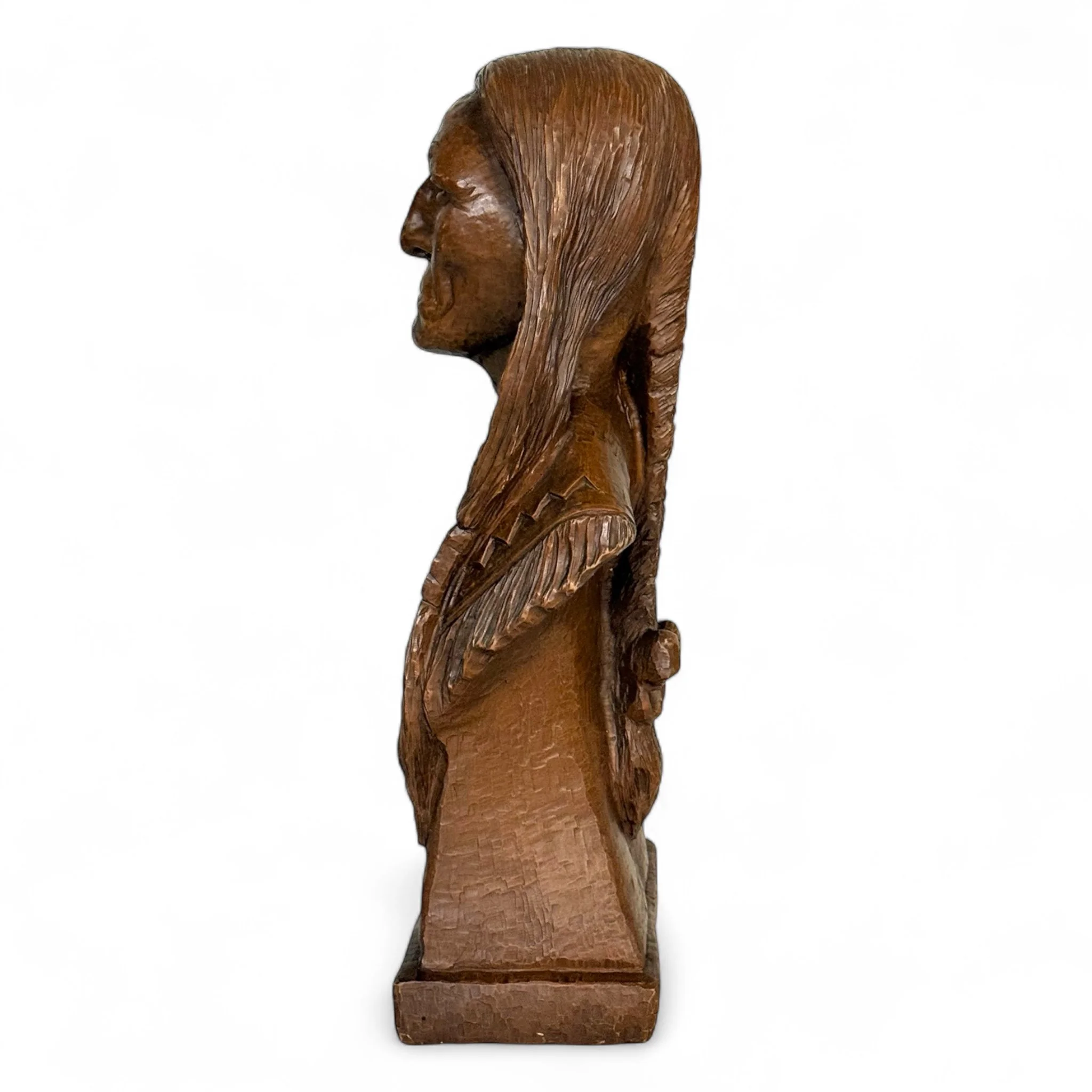 Vintage 1980s Red Mill Mfg Native American Indian chief statue made of crushed pecan shells and resin in reddish brown, detailed tabletop decor.