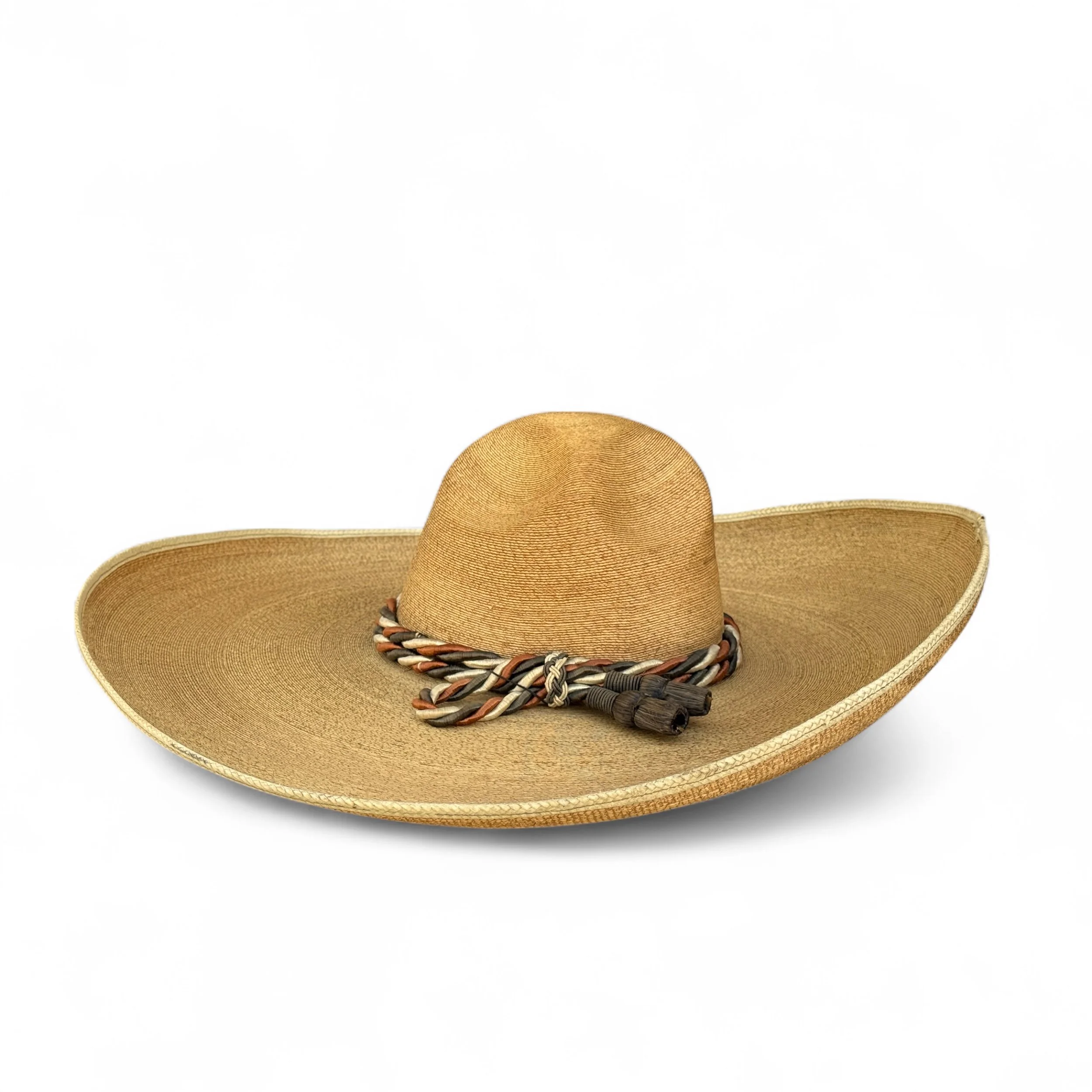 Vintage Mexican sombrero hat with wide brim and decorative details.