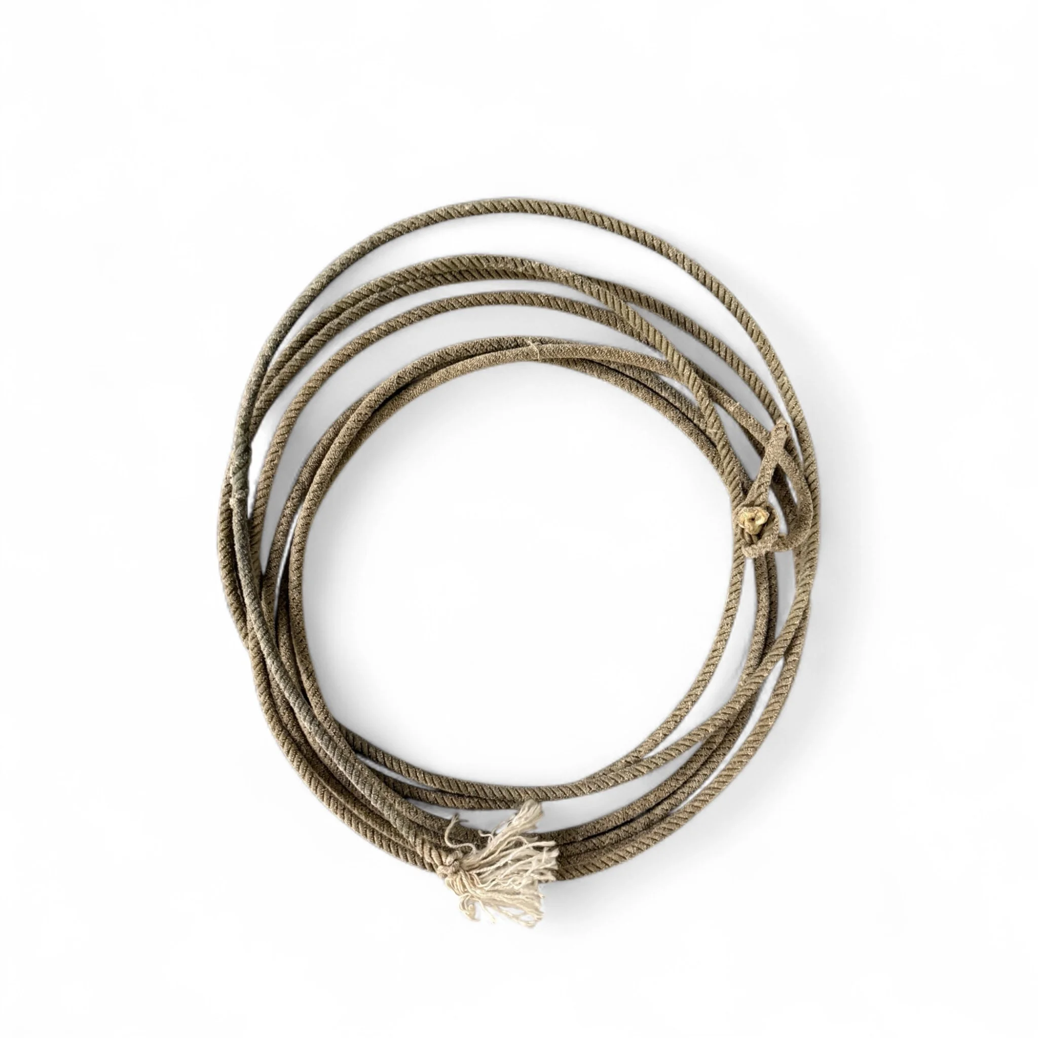 Vintage cowboy lasso rope with rustic patina, perfect for Western decor, rodeo collectors, or ranch style displays. Classic old west cowboy lariat with authentic wear and character.